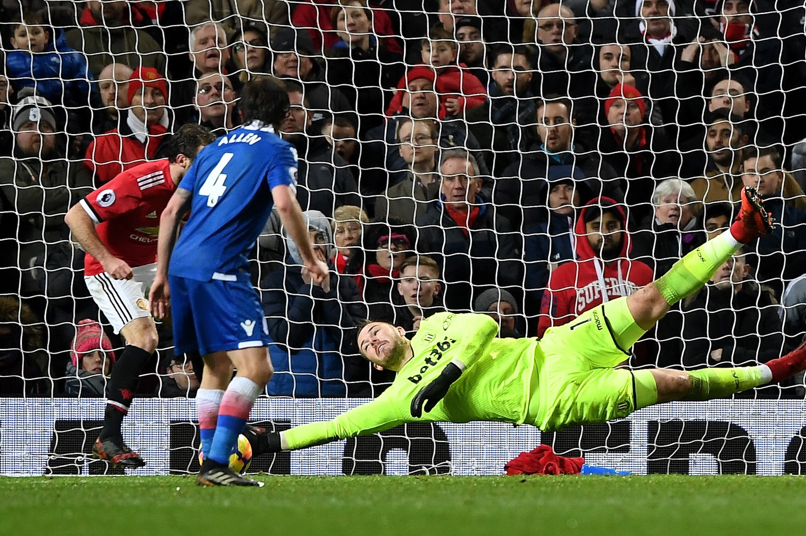 MANCHESTER, ENGLAND - JANUARY 15: Jack Butland of Stoke City makes a save during the Premier League match between Manchester United and Stoke City at Old Trafford on January 15, 2018 in Manchester, England.  (Photo by Gareth Copley/Getty Images)