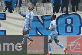 Monaco's Brazilian defender Fabinho (L) celebrates after scoring a goal during the French L1 football match Marseille vs Monaco, on January 28, 2018 at the Velodrome stadium in Marseille, southern France.  / AFP PHOTO / ANNE-CHRISTINE POUJOULAT        (Ph