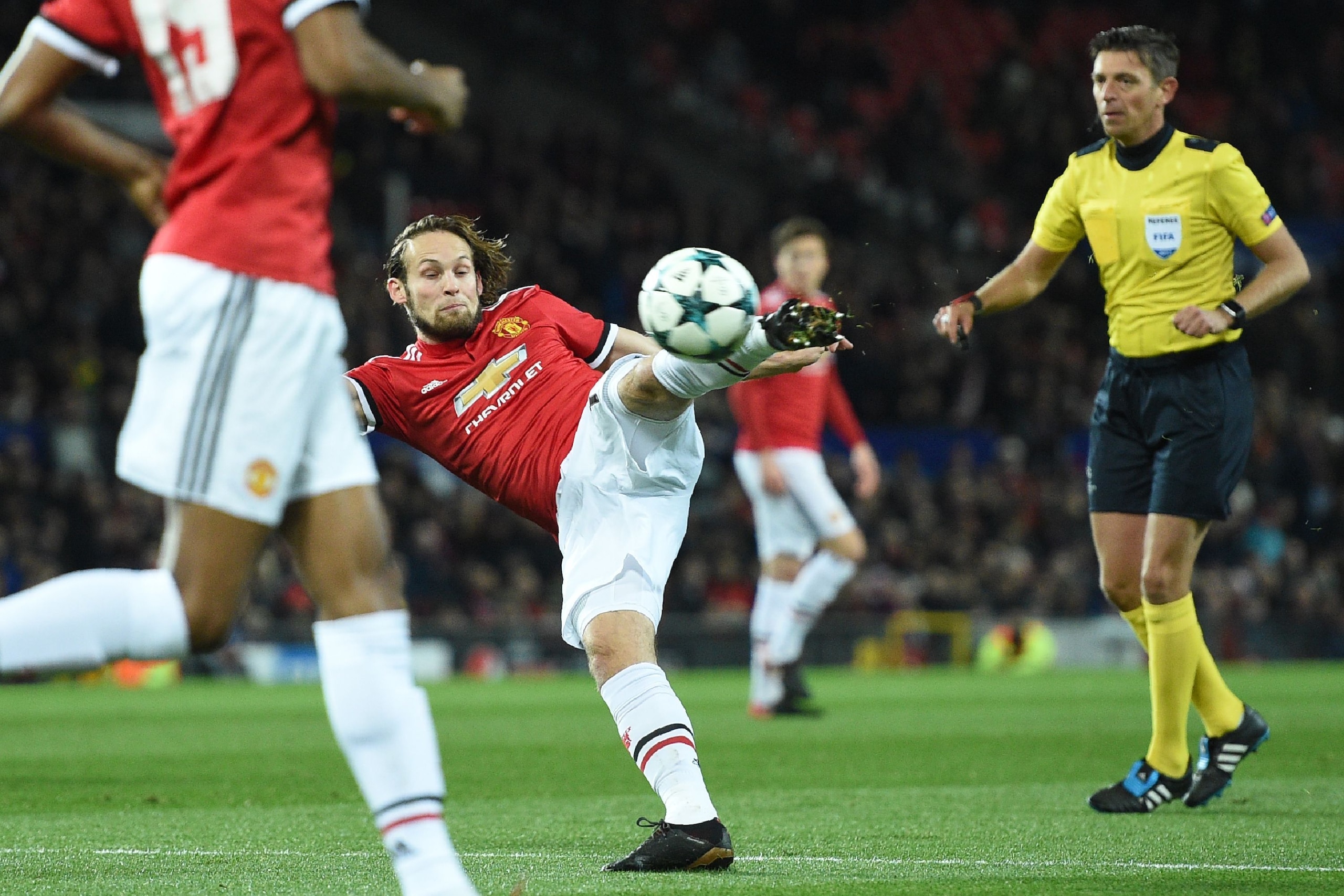 Manchester United's Dutch midfielder Daley Blind has an unsuccessful shot during the UEFA Champions League Group A football match between Manchester United and CSKA Moscow at Old Trafford in Manchester, north west England on December 5, 2017. / AFP PHOTO 