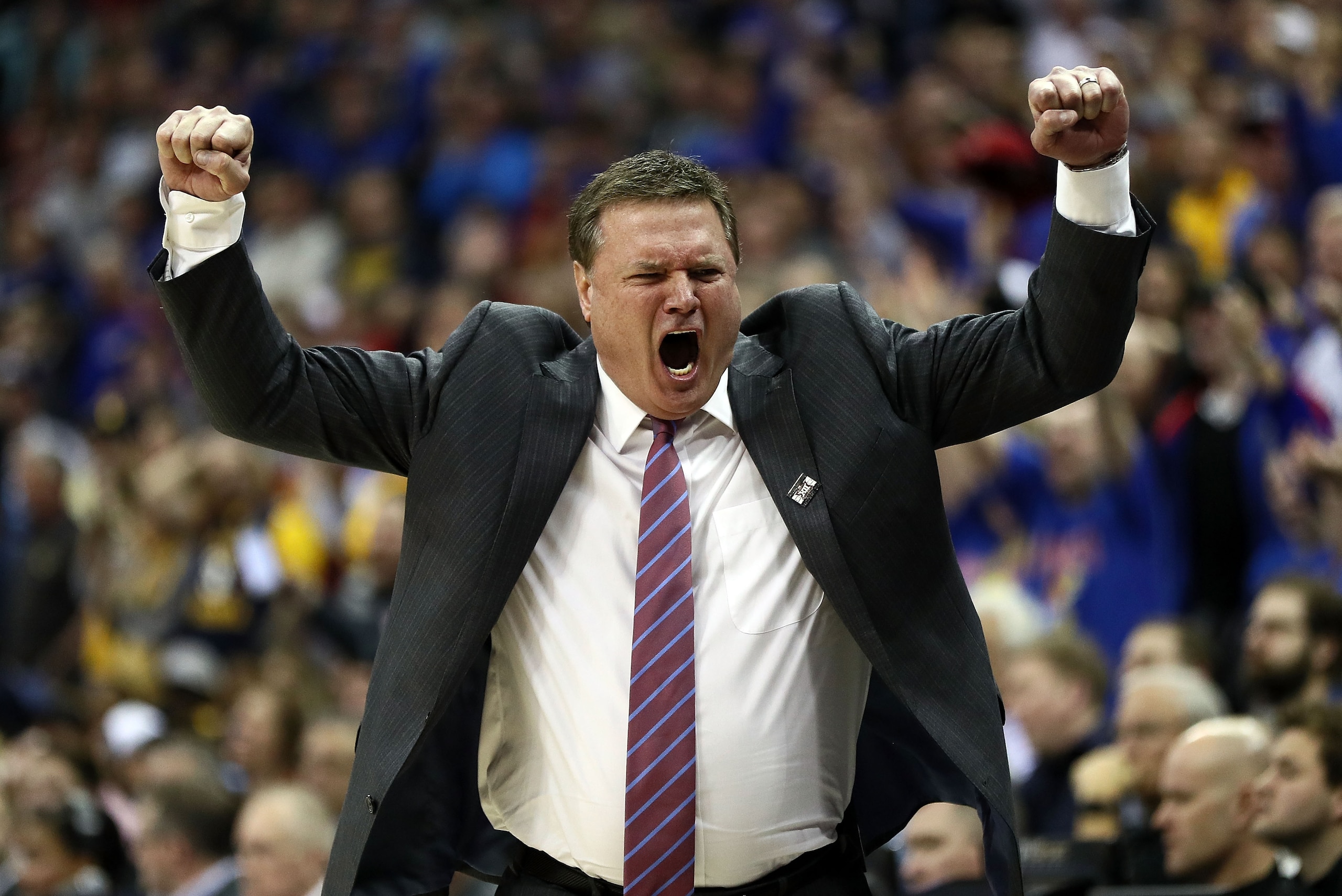 KANSAS CITY, MO - MARCH 10:  Head coach Bill Self of the Kansas Jayhawks celebrates as the Jayhawks defeat the West Virginia Mountaineers 81-70 to win the Big 12 Basketball Tournament Championship game at Sprint Center on March 10, 2018 in Kansas City, Mi