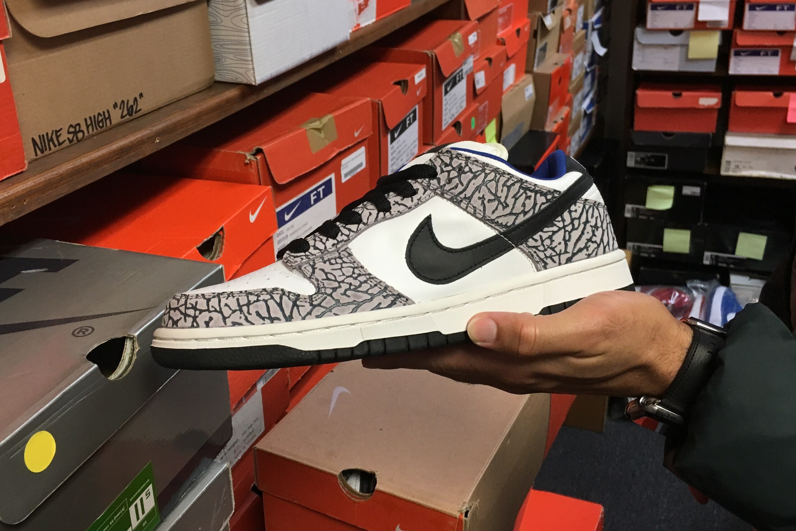 A pair of the Nike Supreme Dunk Low SB sneakers. A pair of the Nike Supreme Dunk Low SB sneakers.