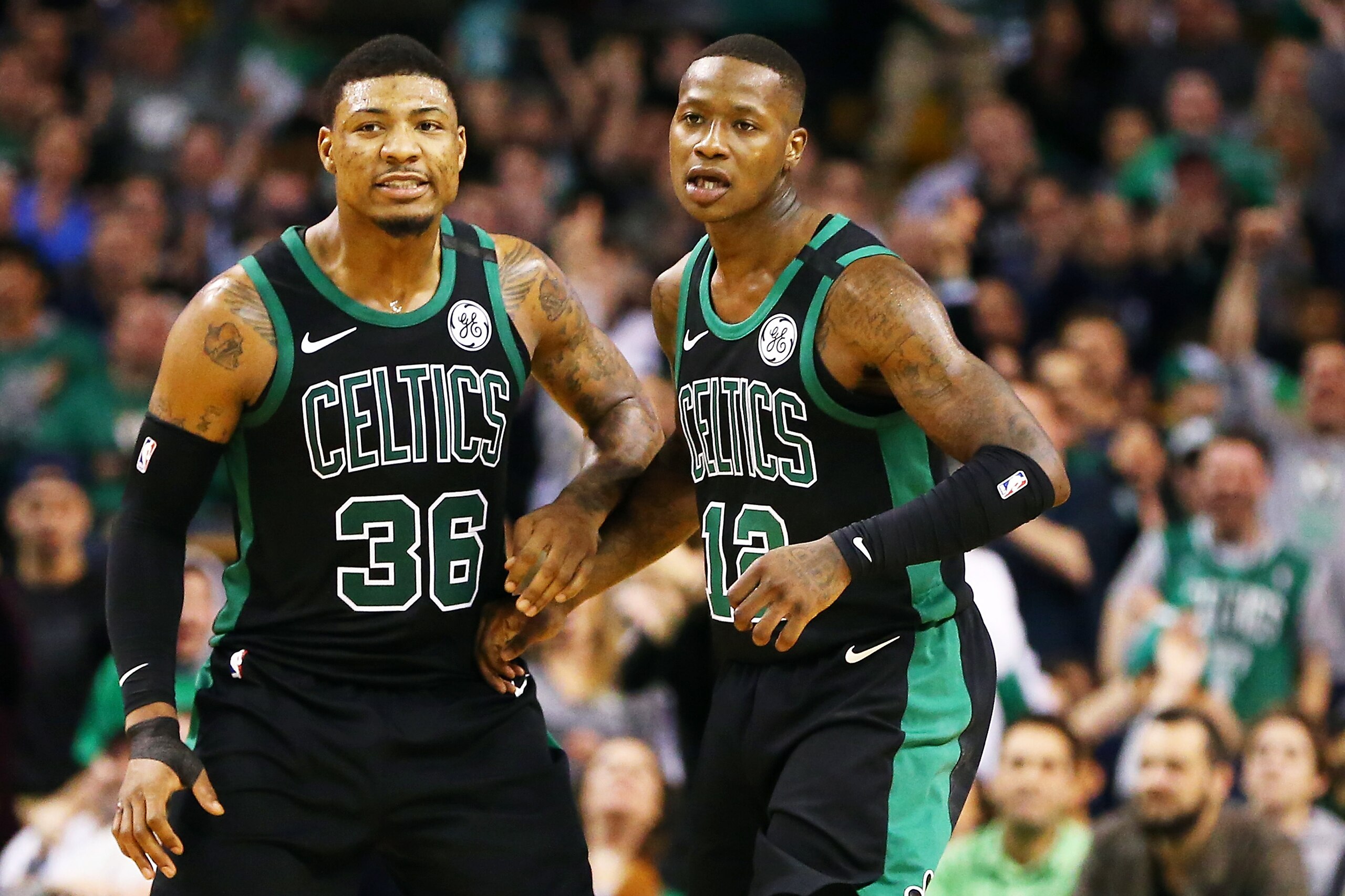 BOSTON, MA - MARCH 11: Terry Rozier #12 and Marcus Smart #36 of the Boston Celtics react after a three-point shot during a game against the Indiana Pacers at TD Garden on March 11, 2018 in Boston, Massachusetts. NOTE TO USER: User expressly acknowledges BOSTON, MA - MARCH 11: Terry Rozier #12 and Marcus Smart #36 of the Boston Celtics react after a three-point shot during a game against the Indiana Pacers at TD Garden on March 11, 2018 in Boston, Massachusetts. NOTE TO USER: User expressly acknowledges