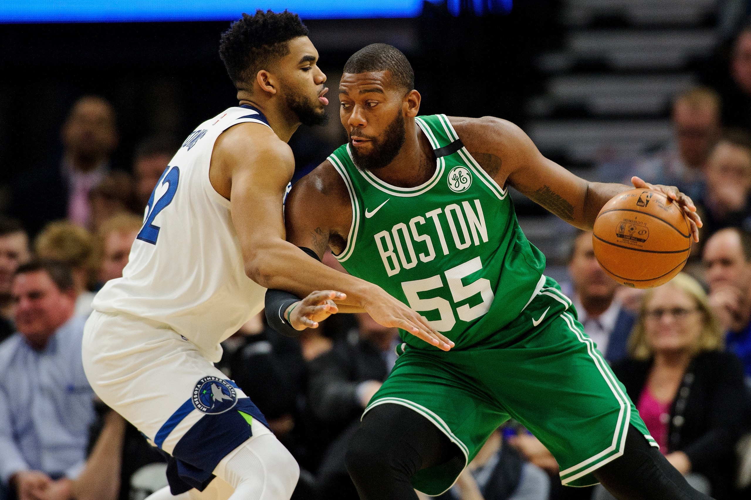 MINNEAPOLIS, MN - MARCH 08: Karl-Anthony Towns #32 of the Minnesota Timberwolves defends against Greg Monroe #55 of the Boston Celtics during the game on March 8, 2018 at the Target Center in Minneapolis, Minnesota. NOTE TO USER: User expressly acknowledg MINNEAPOLIS, MN - MARCH 08: Karl-Anthony Towns #32 of the Minnesota Timberwolves defends against Greg Monroe #55 of the Boston Celtics during the game on March 8, 2018 at the Target Center in Minneapolis, Minnesota. NOTE TO USER: User expressly acknowledg