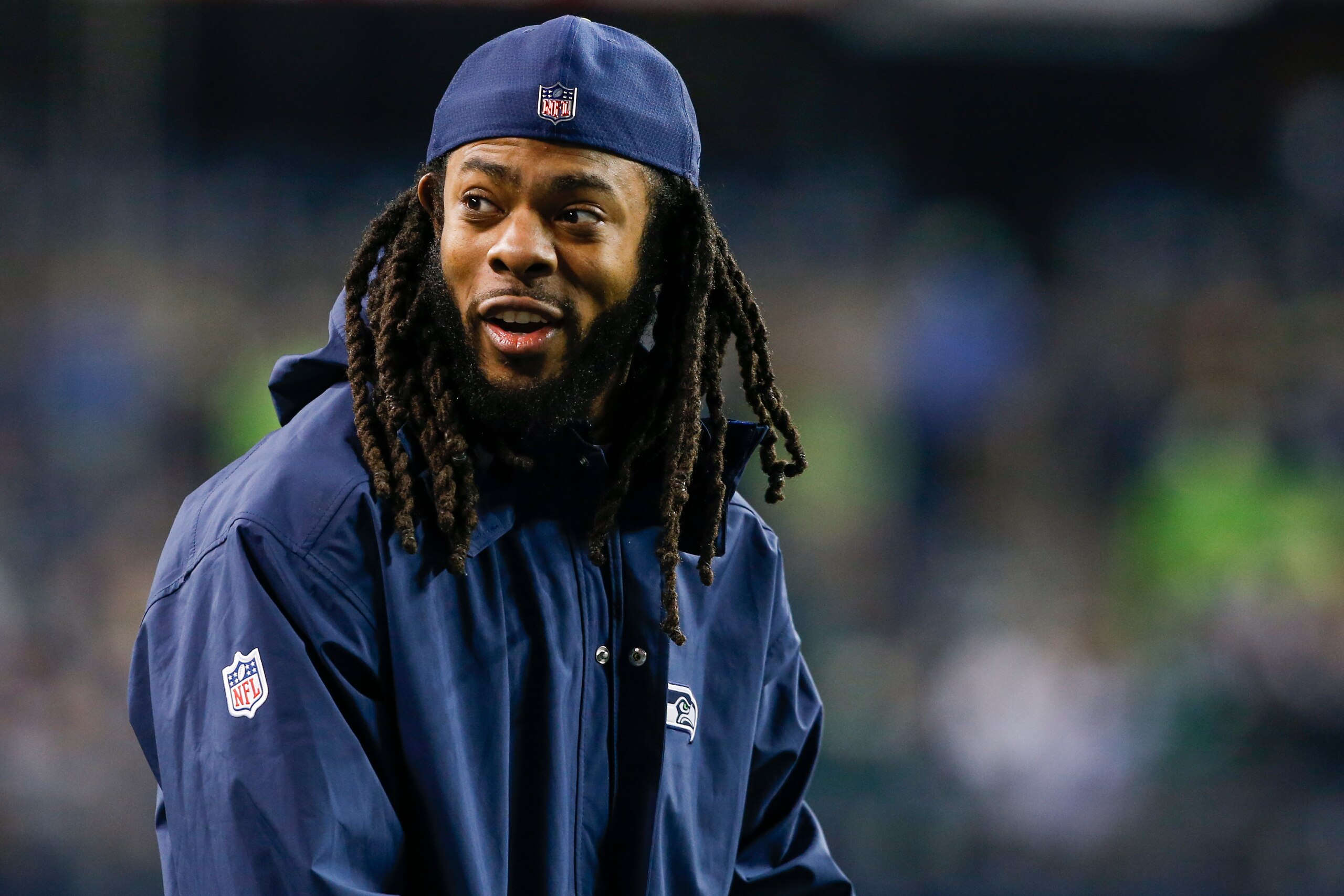 SEATTLE, WA - DECEMBER 03: Injured cornerback Richard Sherman of the Seattle Seahawks smiles from the sidelines before the game against the Philadelphia Eagles at CenturyLink Field on December 3, 2017 in Seattle, Washington. (Photo by Otto Greule Jr /Gett