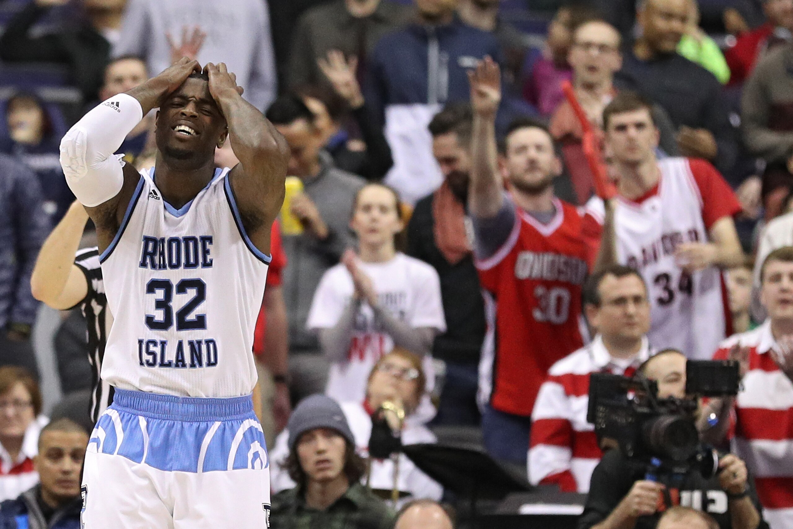WASHINGTON, DC - MARCH 11: Jared Terrell #32 of the Rhode Island Rams reacts against the Davidson Wildcats during the second half in the Championship of the Atlantic 10 Basketball Tournament at Capital One Arena on March 11, 2018 in Washington, DC. (Photo