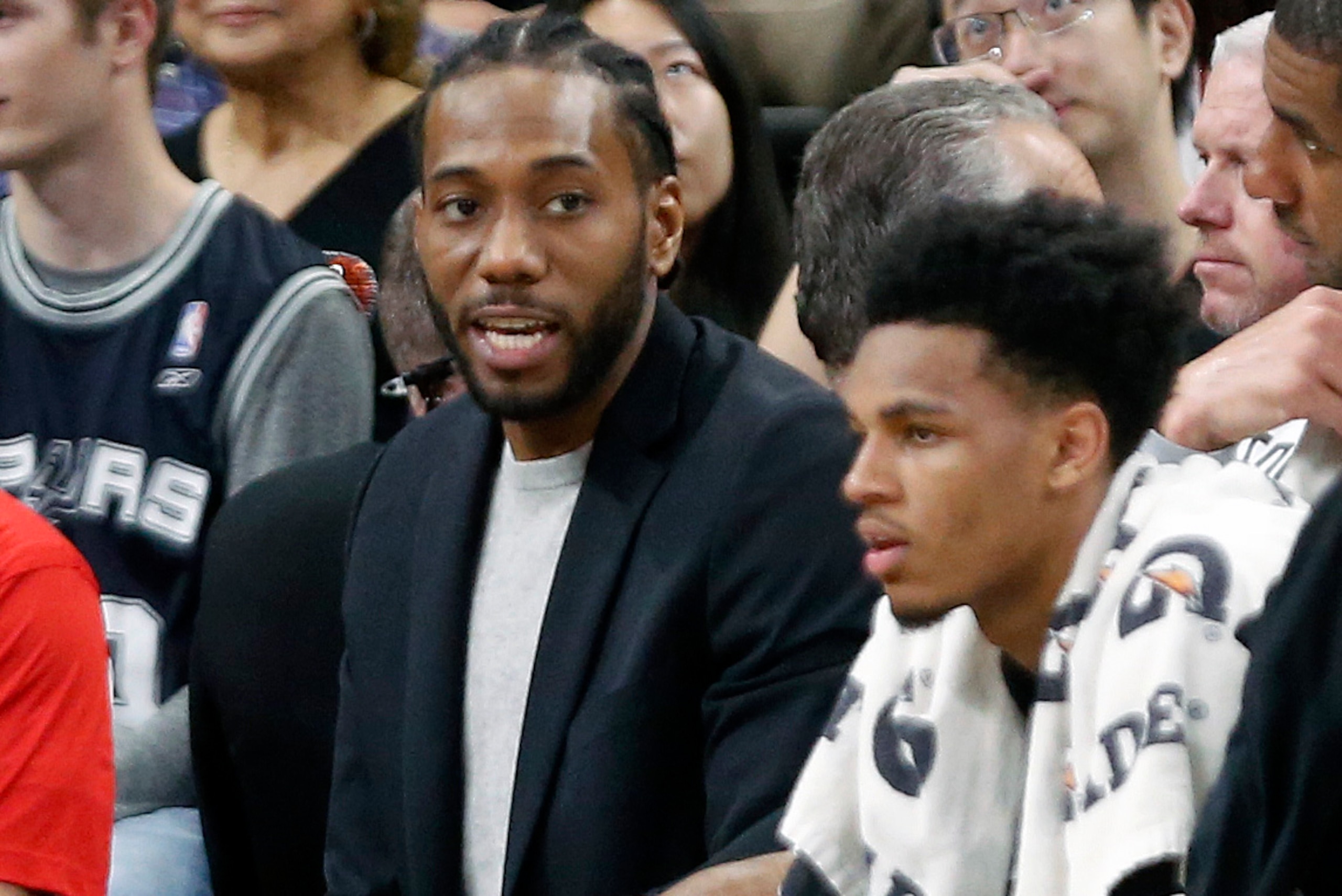 SAN ANTONIO,TX - FEBRUARY 28 : Kawhi Leonard of the San Antonio Spurs sits on the bench in street clothes during a game against the New Orleans Pelicans at AT&T Center on February 28, 2018 in San Antonio, Texas. NOTE TO USER: User expressly acknowledge SAN ANTONIO,TX - FEBRUARY 28 : Kawhi Leonard of the San Antonio Spurs sits on the bench in street clothes during a game against the New Orleans Pelicans at AT&T Center on February 28, 2018 in San Antonio, Texas. NOTE TO USER: User expressly acknowledge
