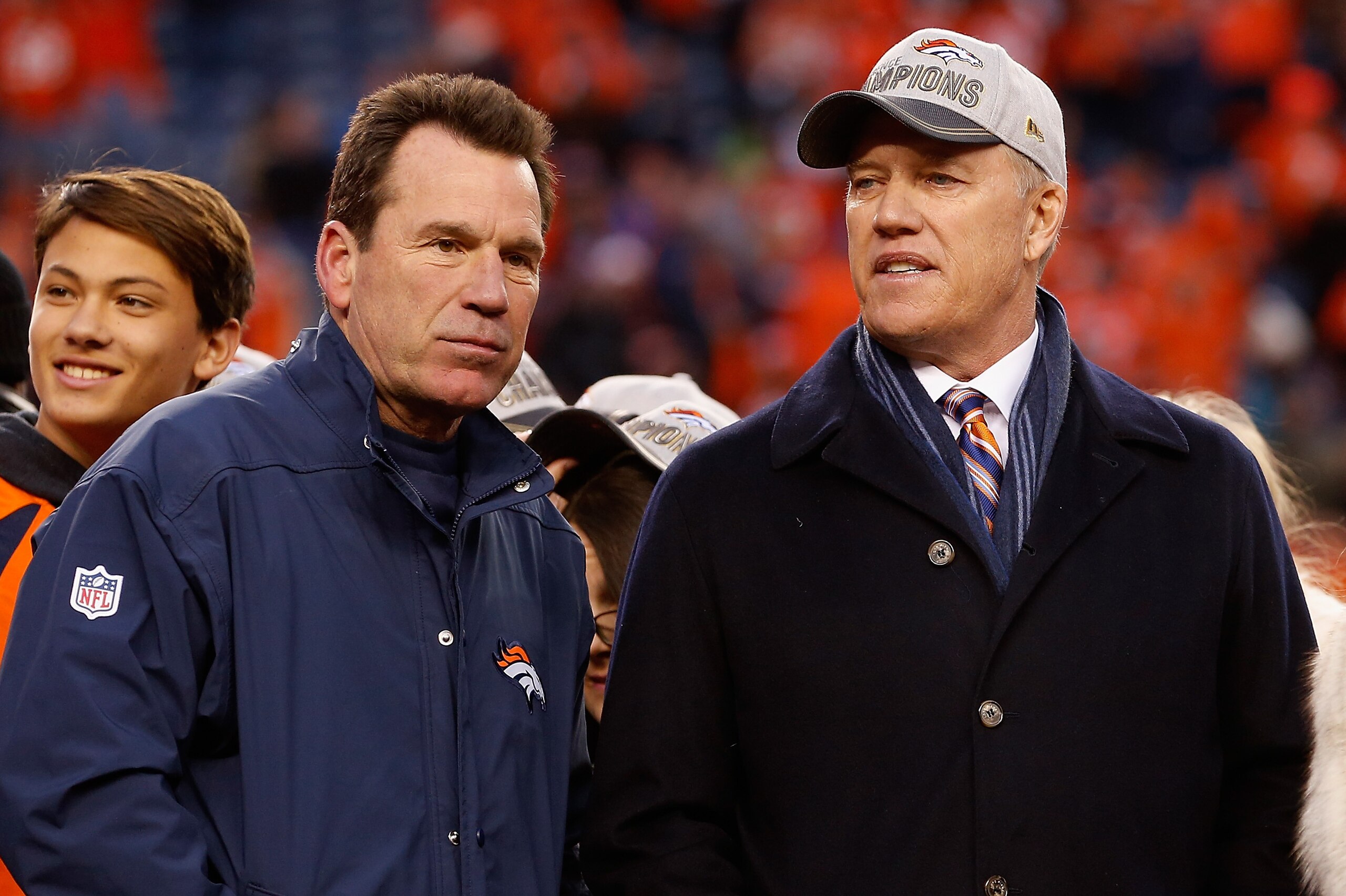 DENVER, CO - JANUARY 24:  Head coach Gary Kubiak and General Manager and Executive Vice President of Football Operation for the Denver Broncos John Elway after defeating the New England Patriots in the AFC Championship game at Sports Authority Field at Mi