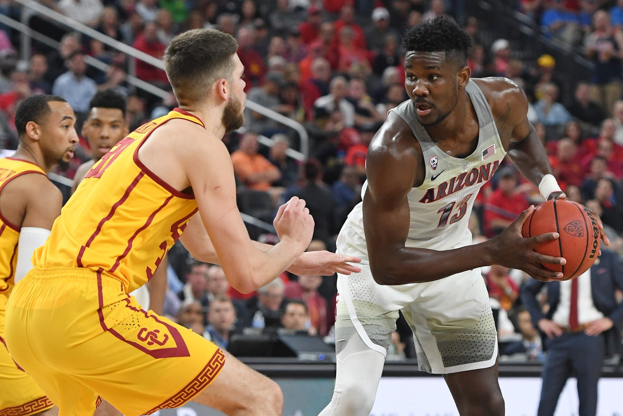LAS VEGAS, NV - MARCH 10:  Nick Rakocevic #31 of the USC Trojans guards Deandre Ayton #13 of the Arizona Wildcats during the championship game of the Pac-12 basketball tournament at T-Mobile Arena on March 10, 2018 in Las Vegas, Nevada. The Wildcats won 7