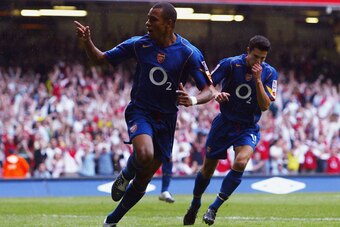 CARDIFF, WALES - AUGUST 8:  Gilberto of Arsenal celebrates scoring their first goal during the FA Community shield match between Arsenal and Manchester United at the Millennium Stadium on August 8, 2004 in Cardiff, Wales. (Photo by Tom Shaw/Getty Images)