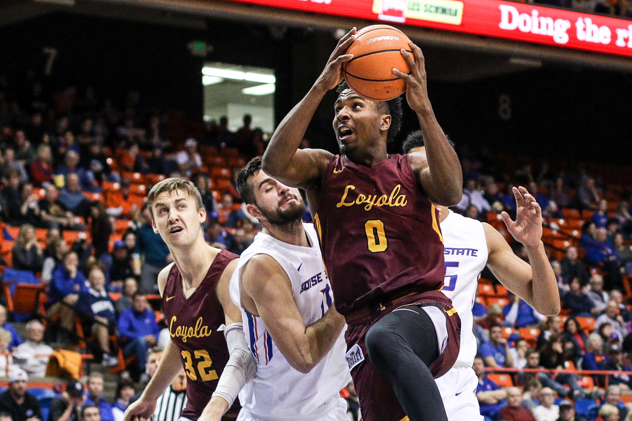 BOISE, ID - NOVEMBER 28: Guard Donte Ingram #0 of the Loyola-Chicago Ramblers drives for two points during second half action against the Boise State Broncos on November 28, 2017 at Taco Bell Arena in Boise, Idaho. Boise State won the game 87-53. (Photo b BOISE, ID - NOVEMBER 28: Guard Donte Ingram #0 of the Loyola-Chicago Ramblers drives for two points during second half action against the Boise State Broncos on November 28, 2017 at Taco Bell Arena in Boise, Idaho. Boise State won the game 87-53. (Photo b