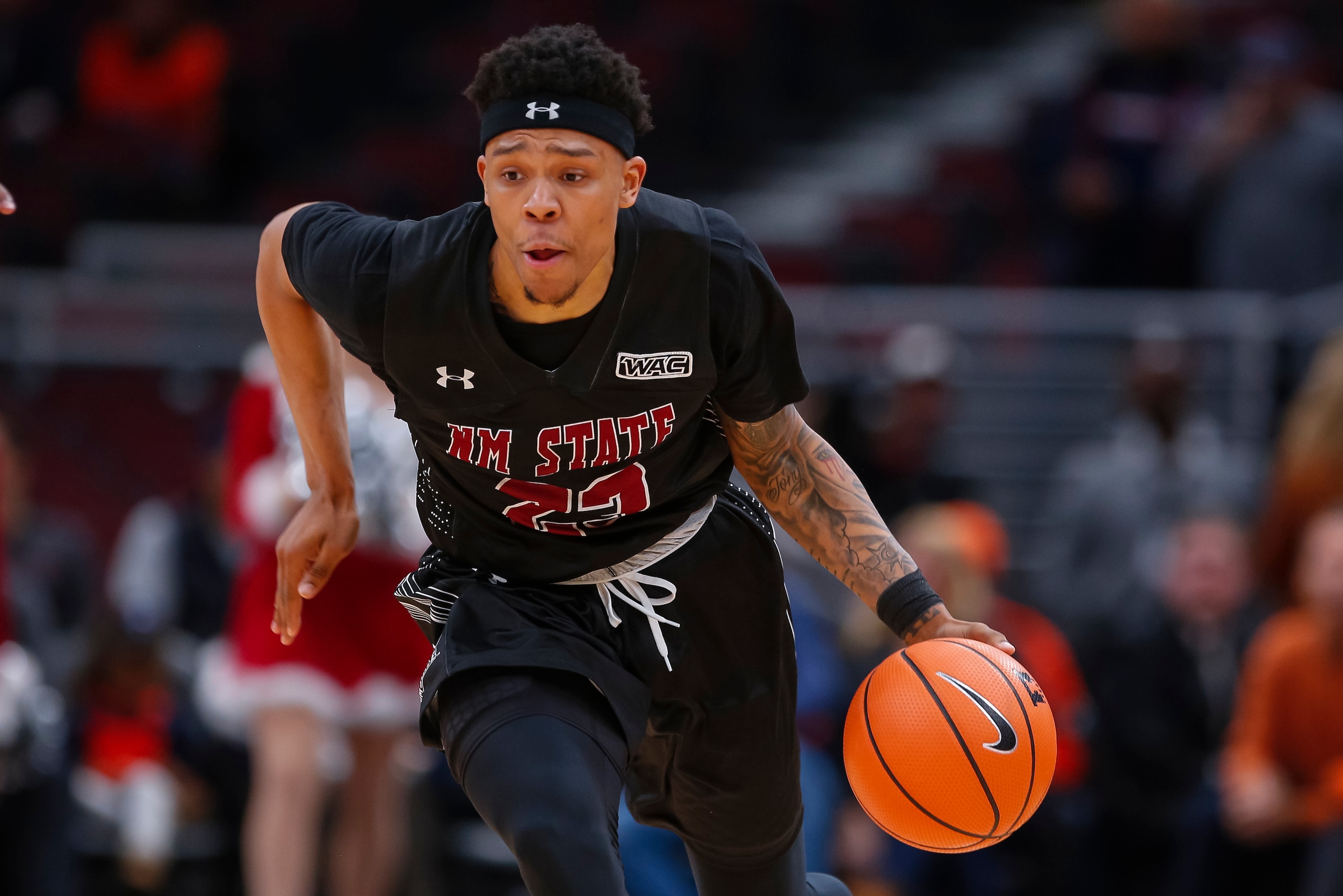 CHAMPAIGN, IL - DECEMBER 16: Zach Lofton #23 of the New Mexico State Aggies brings the ball up court against the Illinois Fighting Illini at United Center on December 16, 2017 in Chicago, Illinois. (Photo by Michael Hickey/Getty Images) CHAMPAIGN, IL - DECEMBER 16: Zach Lofton #23 of the New Mexico State Aggies brings the ball up court against the Illinois Fighting Illini at United Center on December 16, 2017 in Chicago, Illinois. (Photo by Michael Hickey/Getty Images)