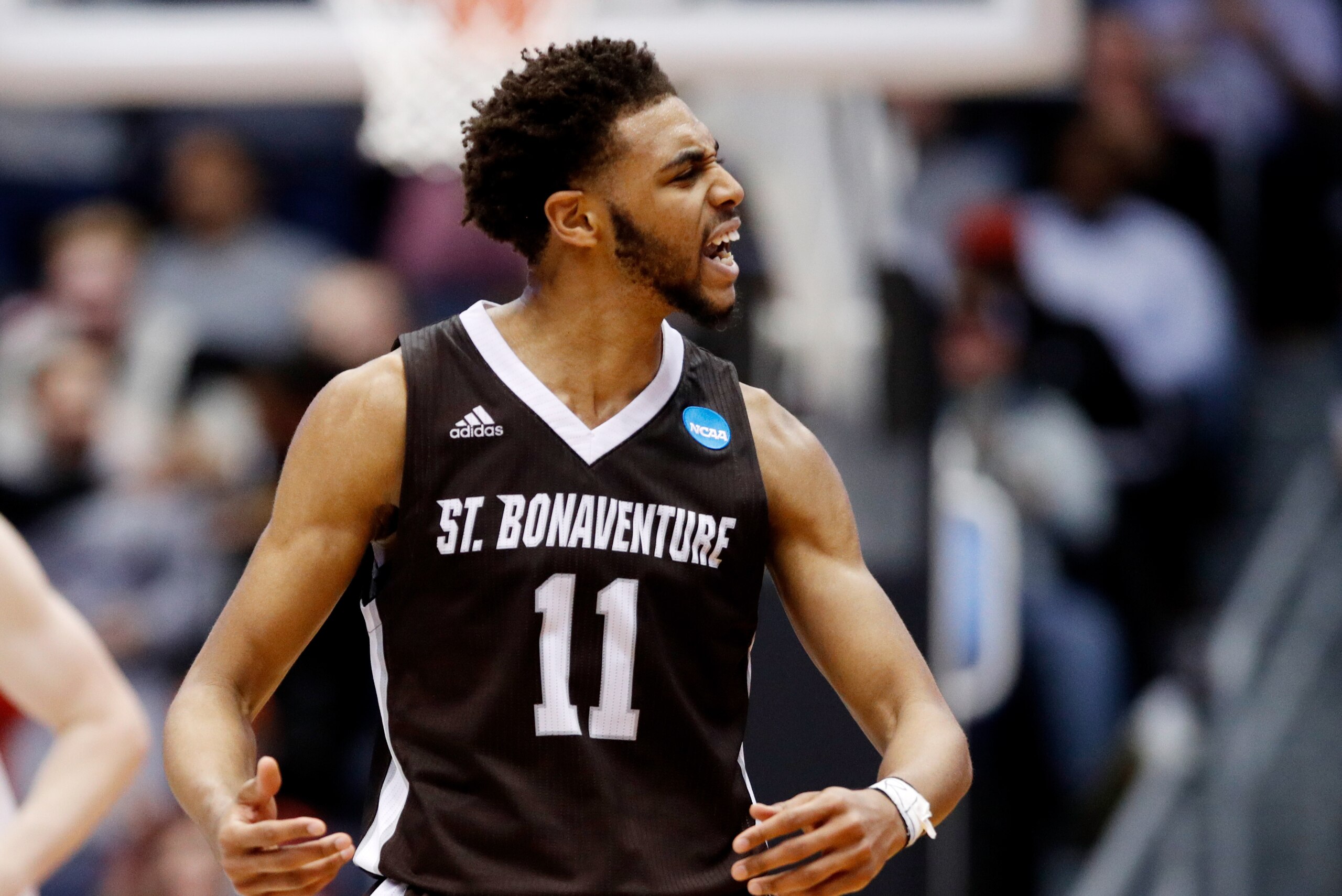 DAYTON, OH - MARCH 13:  Courtney Stockard #11 of the St. Bonaventure Bonnies celebrates the basket against the UCLA Bruins during the second half of the First Four game in the 2018 NCAA Men's Basketball Tournament at UD Arena on March 13, 2018 in Dayton, 