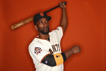 SCOTTSDALE, AZ - FEBRUARY 20: Andrew McCutchen #22 of the San Francisco Giants poses on photo day during MLB Spring Training at Scottsdale Stadium on February 20, 2018 in Scottsdale, Arizona. (Photo by Patrick Smith/Getty Images)