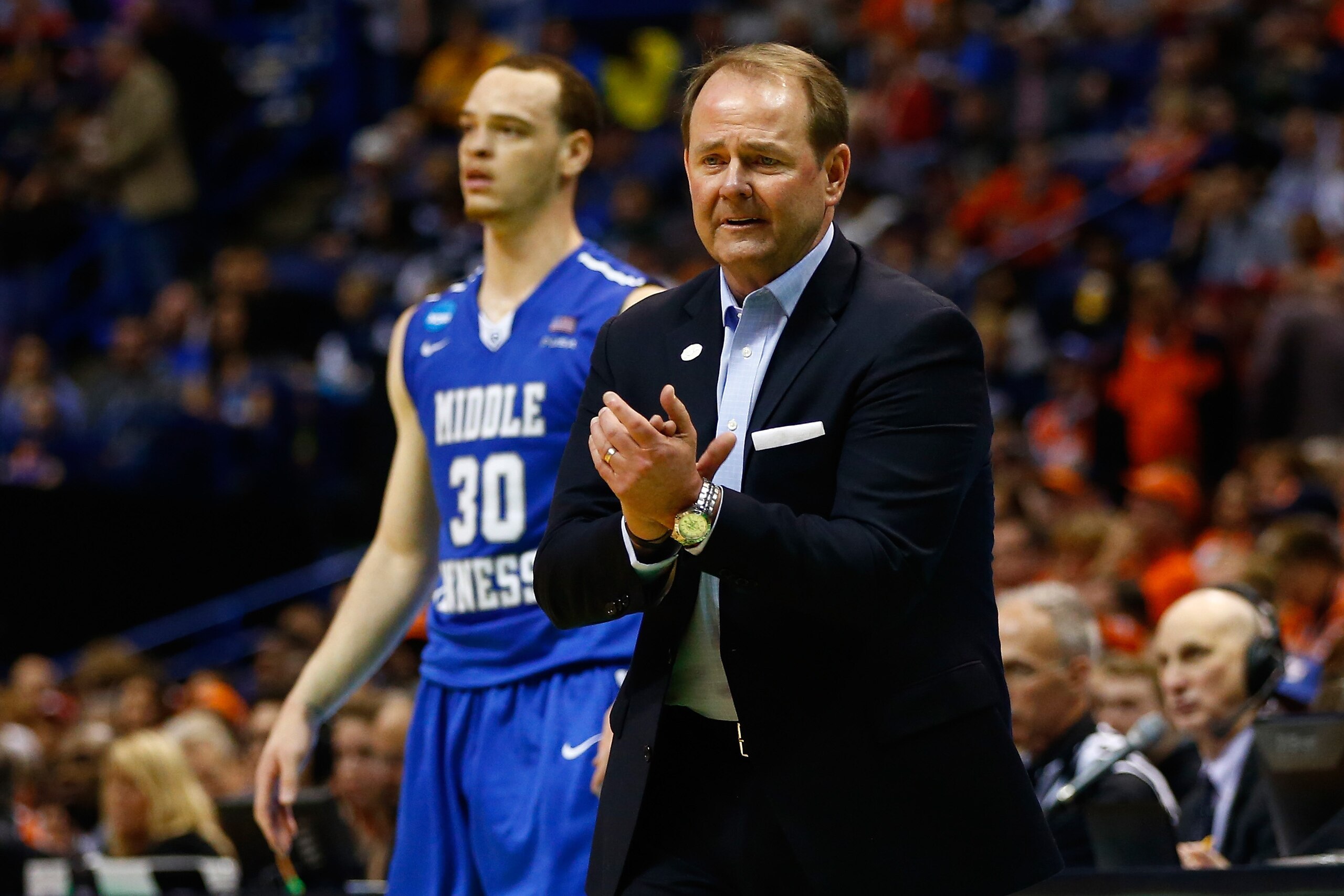 ST LOUIS, MO - MARCH 20: Head coach Kermit Davis of the Middle Tennessee Blue Raiders looks on with Reggie Upshaw #30 in the second half against the Syracuse Orange during the second round of the 2016 NCAA Men's Basketball Tournament at Scottrade Center o