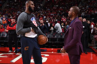 HOUSTON, TX - NOVEMBER 9:  Chris Paul #3 of the Houston Rockets talks with LeBron James #23 of the Cleveland Cavaliers on NOVEMBER 9, 2017 at the Toyota Center in Houston, Texas. NOTE TO USER: User expressly acknowledges and agrees that, by downloading an