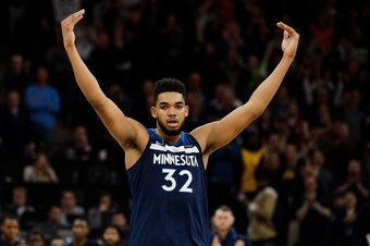 MINNEAPOLIS, MN - MARCH 11: Karl-Anthony Towns #32 of the Minnesota Timberwolves celebrates during the game against the Golden State Warriors on March 11, 2018 at the Target Center in Minneapolis, Minnesota. NOTE TO USER: User expressly acknowledges and a