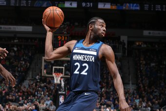 MINNEAPOLIS, MN - MARCH 11: Andrew Wiggins #22 of the Minnesota Timberwolves looks to pass the ball during the game against the Golden State Warriors on March 11, 2018 at Target Center in Minneapolis, Minnesota. NOTE TO USER: User expressly acknowledges a