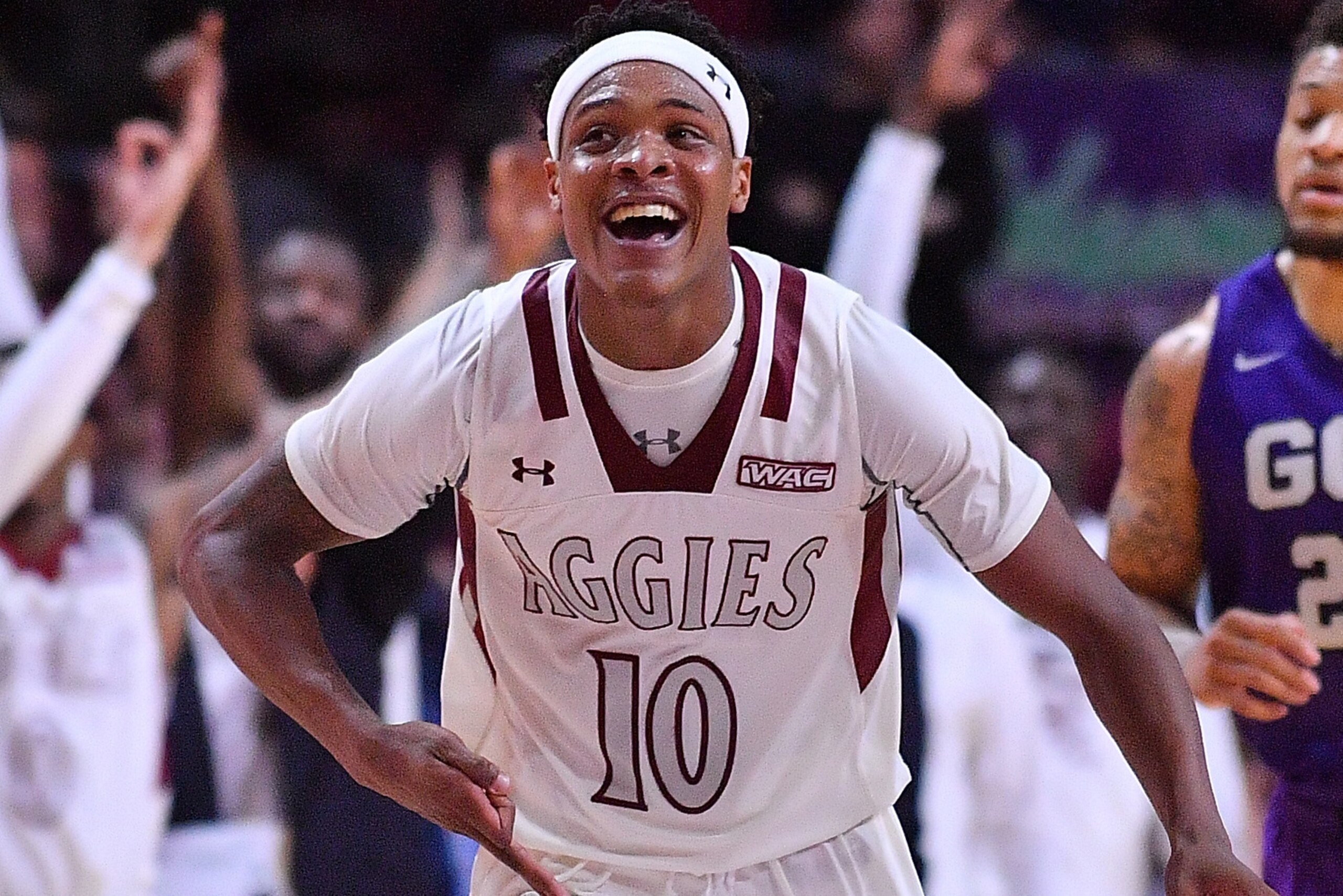LAS VEGAS, NV - MARCH 10:  Jemerrio Jones #10 of the New Mexico State Aggies celebrates on the court during the championship game of the Western Athletic Conference basketball tournament against the Grand Canyon Lopes at the Orleans Arena on March 10, 201