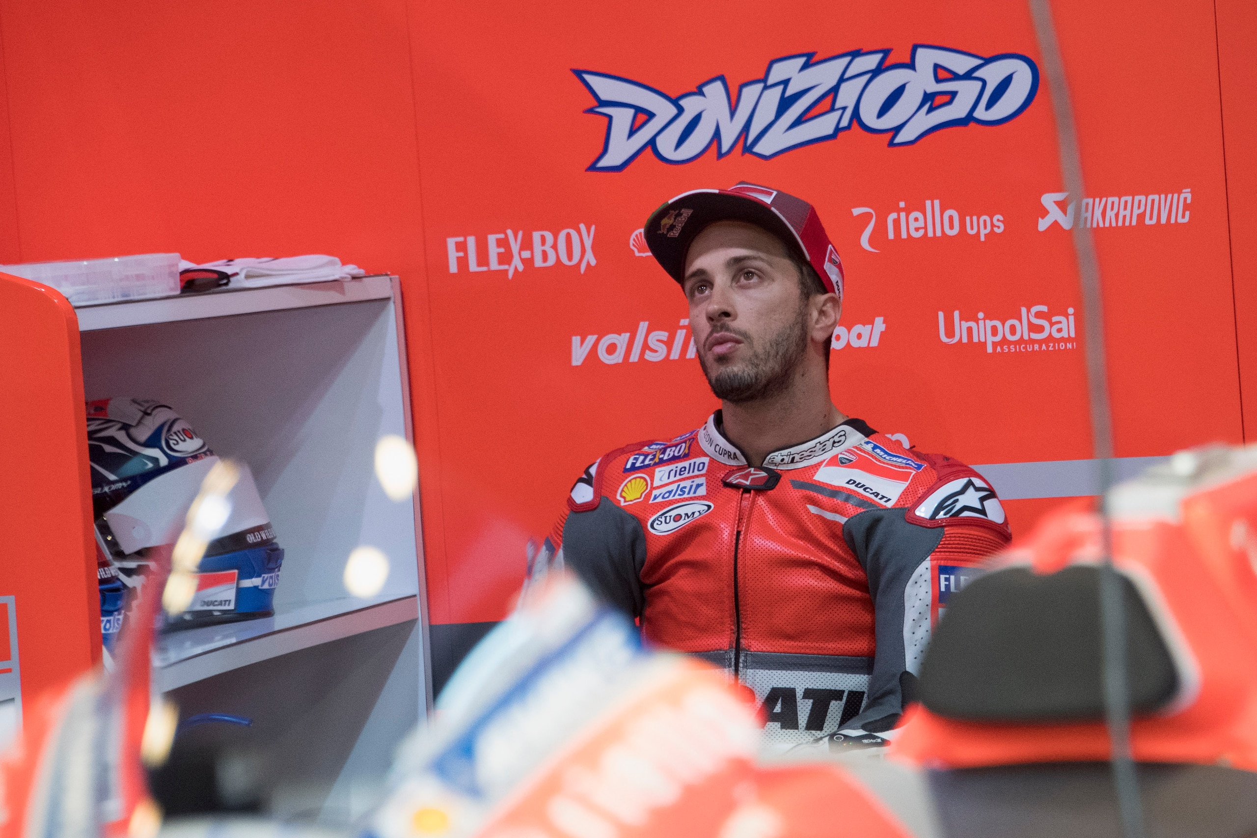 DOHA, QATAR - MARCH 02: Andrea Dovizioso of Italy and Ducati Team looks on in the pit during the Moto GP Testing - Qatar at Losail Circuit on March 2, 2018 in Doha, Qatar. (Photo by Mirco Lazzari gp/Getty Images)