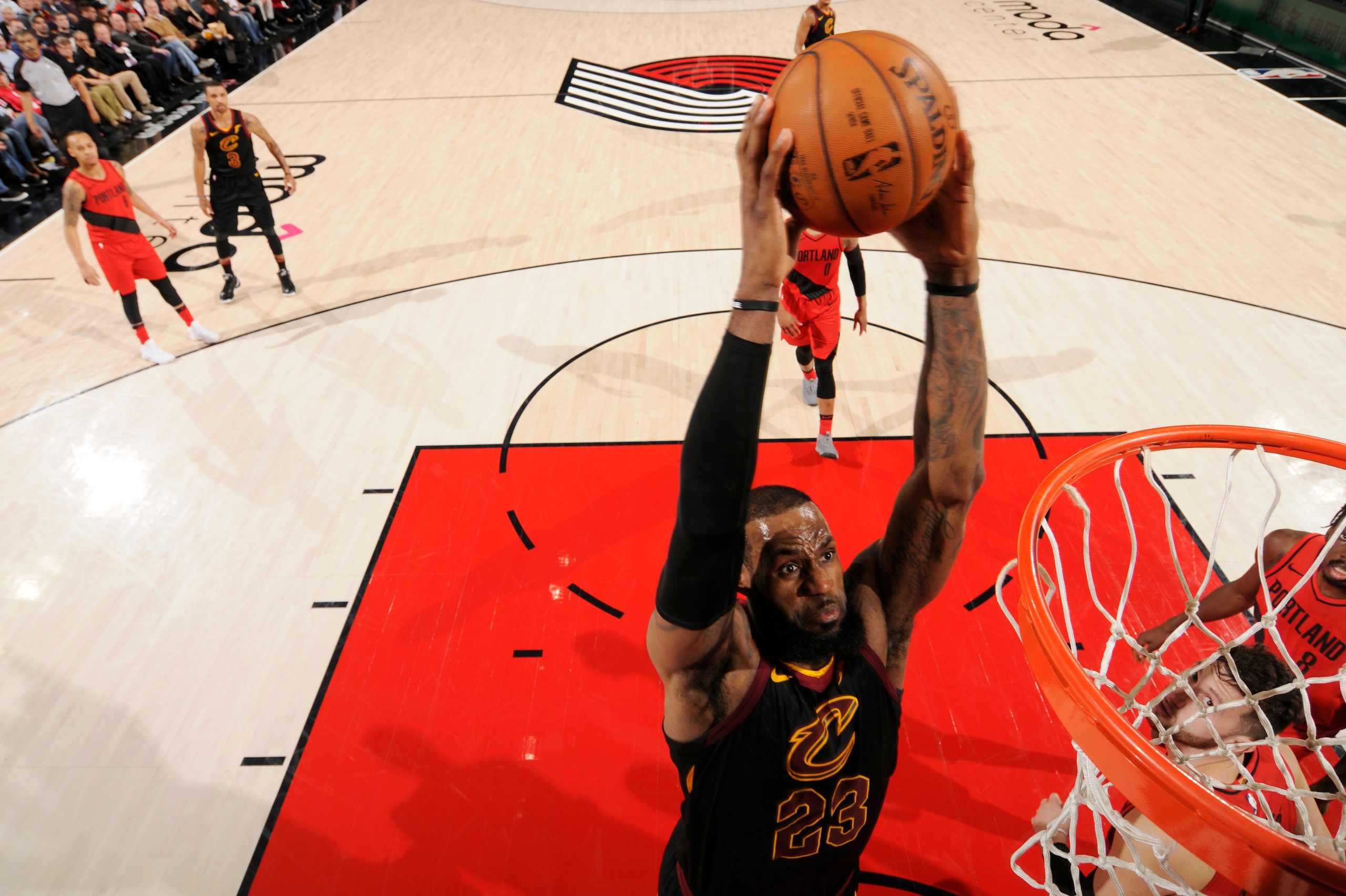 PORTLAND, OR - MARCH 15: LeBron James #23 of the Cleveland Cavaliers goes up for a dunk against the Portland Trail Blazers on March 15, 2018 at the Moda Center in Portland, Oregon. NOTE TO USER: User expressly acknowledges and agrees that, by downloading 