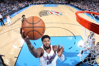OKLAHOMA CITY, OK - MARCH 12: Paul George #13 of the Oklahoma City Thunder goes to the basket against the Sacramento Kings on March 12, 2018 at Chesapeake Energy Arena in Oklahoma City, Oklahoma. NOTE TO USER: User expressly acknowledges and agrees that, 
