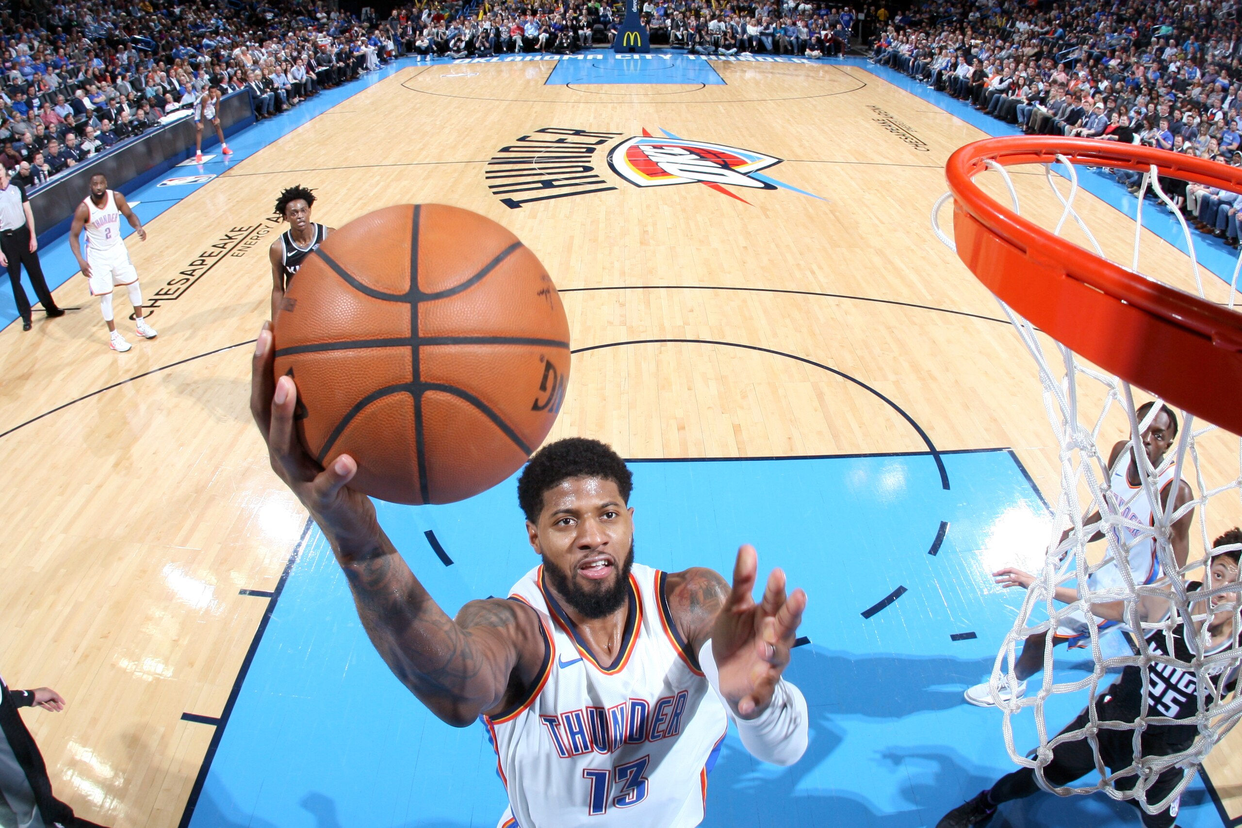 OKLAHOMA CITY, OK - MARCH 12: Paul George #13 of the Oklahoma City Thunder goes to the basket against the Sacramento Kings on March 12, 2018 at Chesapeake Energy Arena in Oklahoma City, Oklahoma. NOTE TO USER: User expressly acknowledges and agrees that, 