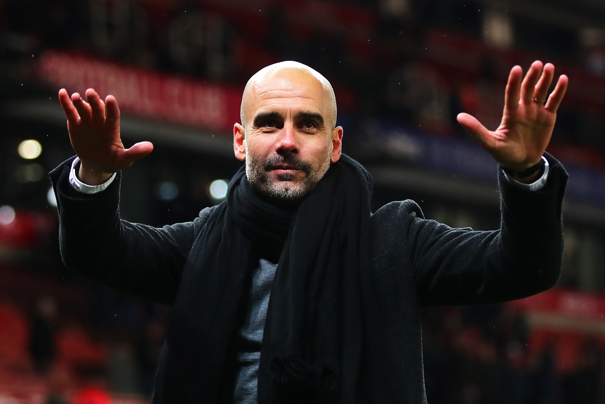 STOKE ON TRENT, ENGLAND - MARCH 12: Manchester City manager Josep Guardiola waves to the crowd following the Premier League match between Stoke City and Manchester City at Bet365 Stadium on March 12, 2018 in Stoke on Trent, England. (Photo by Chris Brunsk