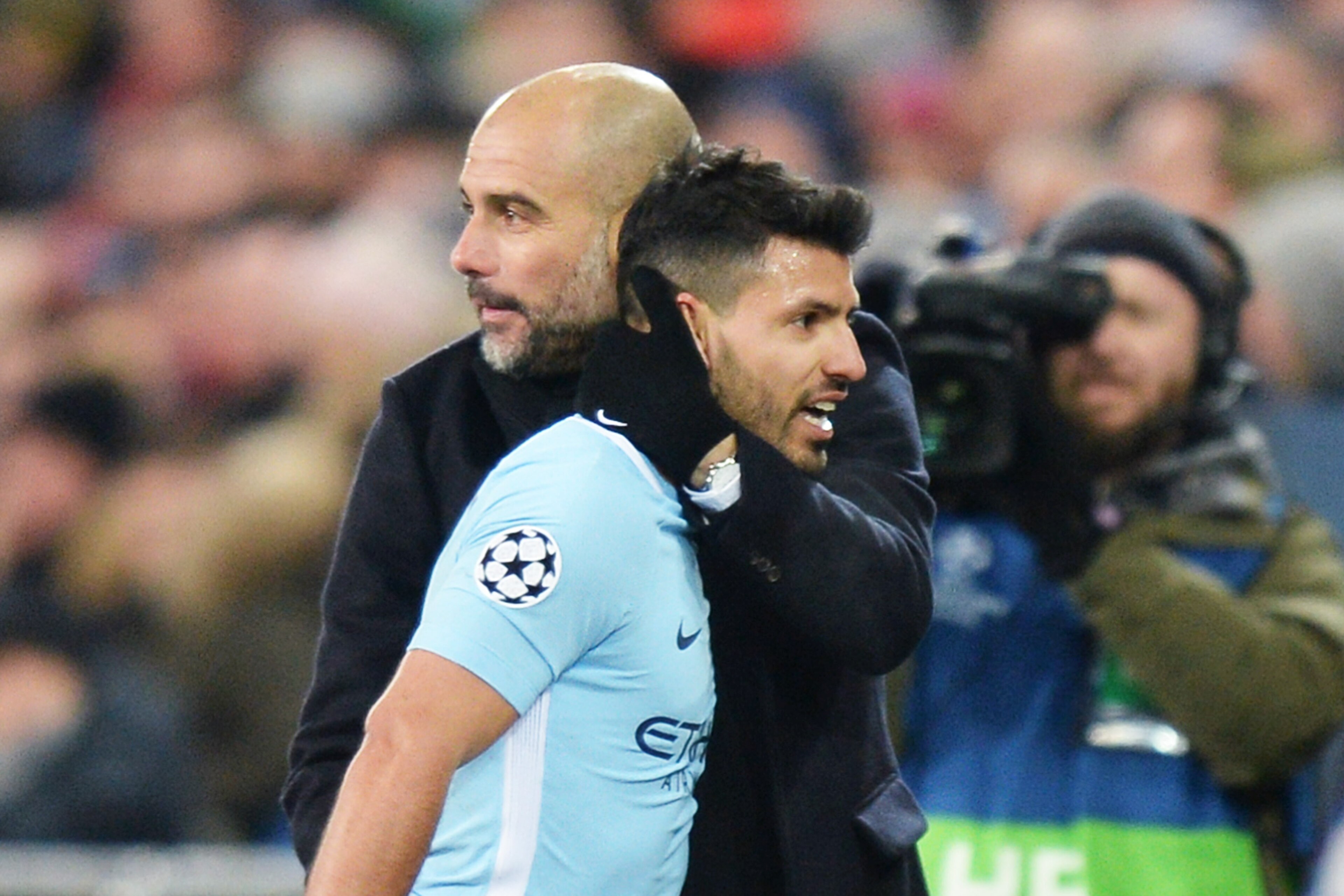 BASEL, SWITZERLAND - FEBRUARY 13: Head coach Pep Guardiola of Manchester City hugs Sergio Aguero of Manchester City during the UEFA Champions League Round of 16 First Leg match between FC Basel and Manchester City at St. Jakob-Park on February 13, 2018 in