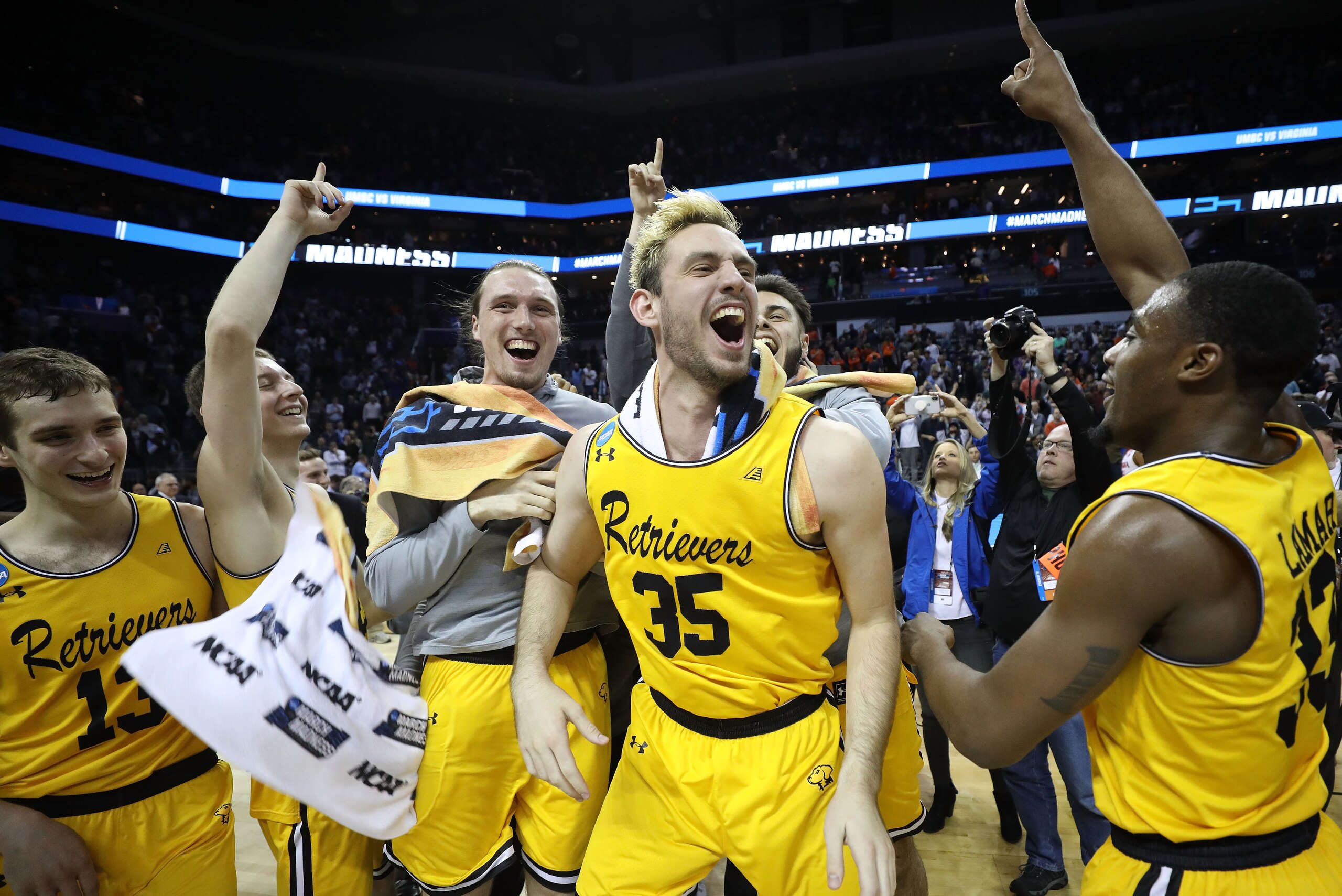 CHARLOTTE, NC - MARCH 16:  The UMBC Retrievers bench reacts to their 74-54 victory over the Virginia Cavaliers during the first round of the 2018 NCAA Men's Basketball Tournament at Spectrum Center on March 16, 2018 in Charlotte, North Carolina.  (Photo b