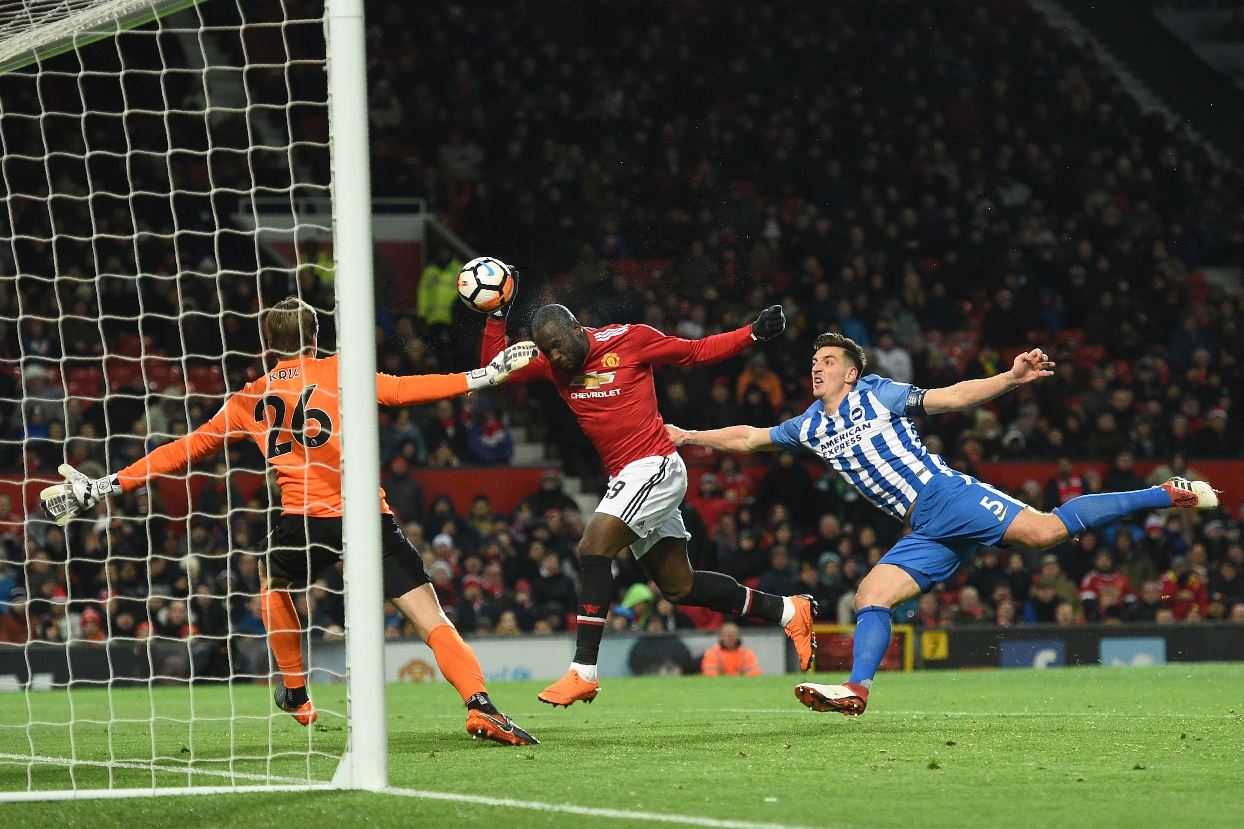 Manchester United's Belgian striker Romelu Lukaku (C) scores the team's first goal during the English FA Cup quarter-final football match between Manchester United and Brighton and Hove Albion at Old Trafford in Manchester, north west England, on March 17 Manchester United's Belgian striker Romelu Lukaku (C) scores the team's first goal during the English FA Cup quarter-final football match between Manchester United and Brighton and Hove Albion at Old Trafford in Manchester, north west England, on March 17
