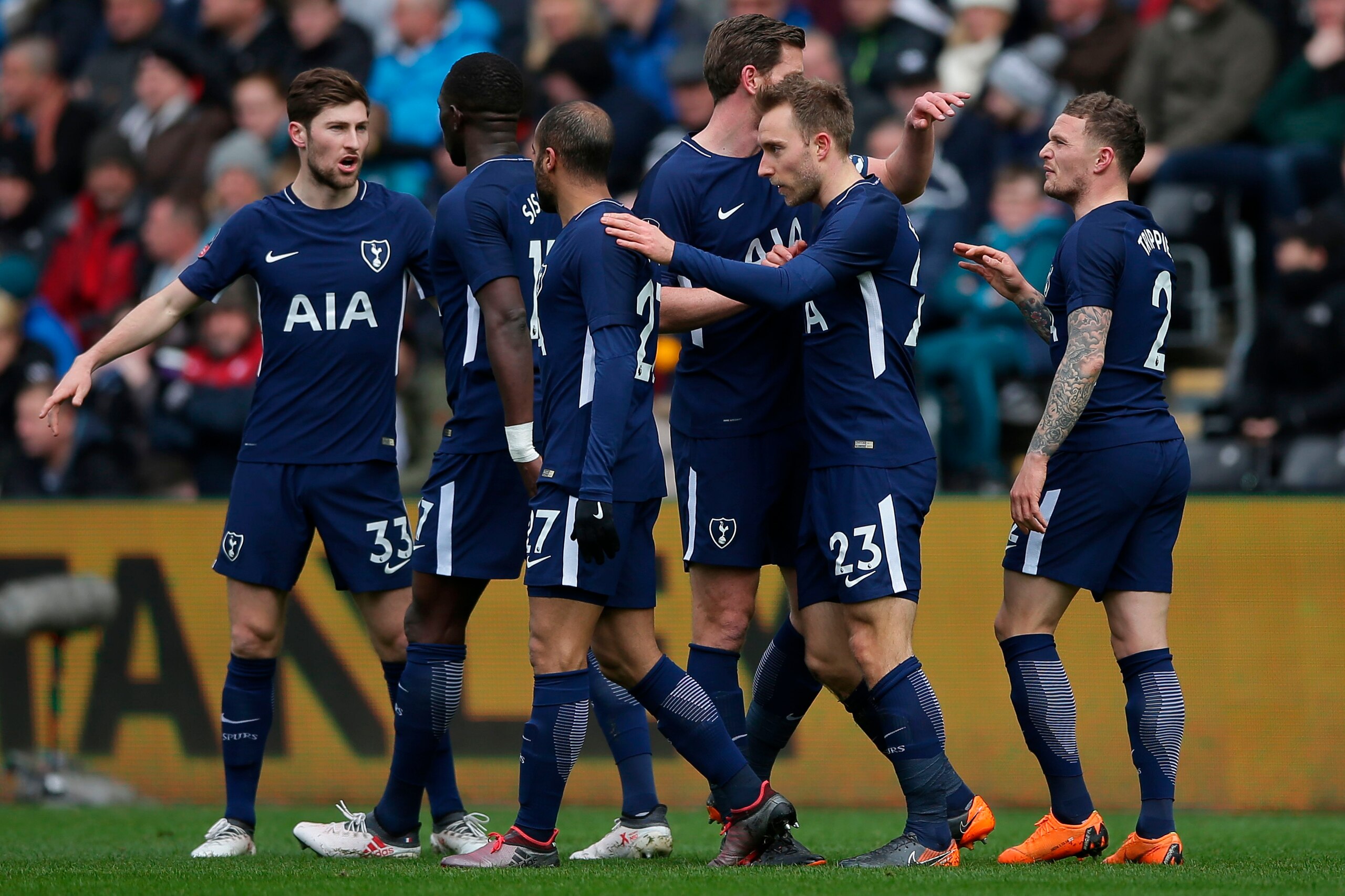 Tottenham Hotspur's Danish midfielder Christian Eriksen (2R) celebrates scoring the opening goal during the English FA Cup quarter-final football match between Swansea City and Tottenham Hotspur at The Liberty Stadium in Swansea, south Wales on March 17, Tottenham Hotspur's Danish midfielder Christian Eriksen (2R) celebrates scoring the opening goal during the English FA Cup quarter-final football match between Swansea City and Tottenham Hotspur at The Liberty Stadium in Swansea, south Wales on March 17,