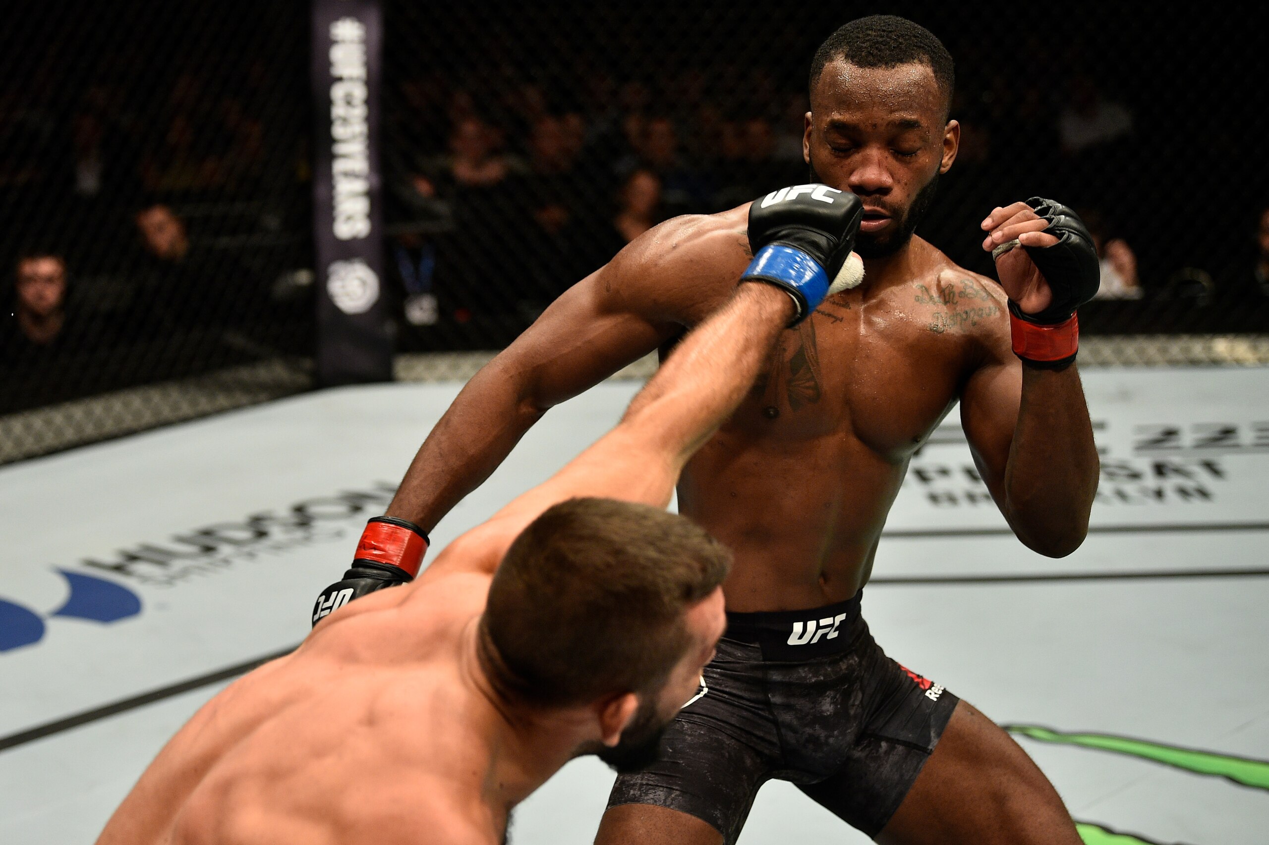 LONDON, ENGLAND - MARCH 17:  (L-R) Peter Sobotta of Poland punches Leon Edwards of Jamaica in their welterweight bout inside The O2 Arena on March 17, 2018 in London, England. (Photo by Brandon Magnus/Zuffa LLC/Zuffa LLC via Getty Images)