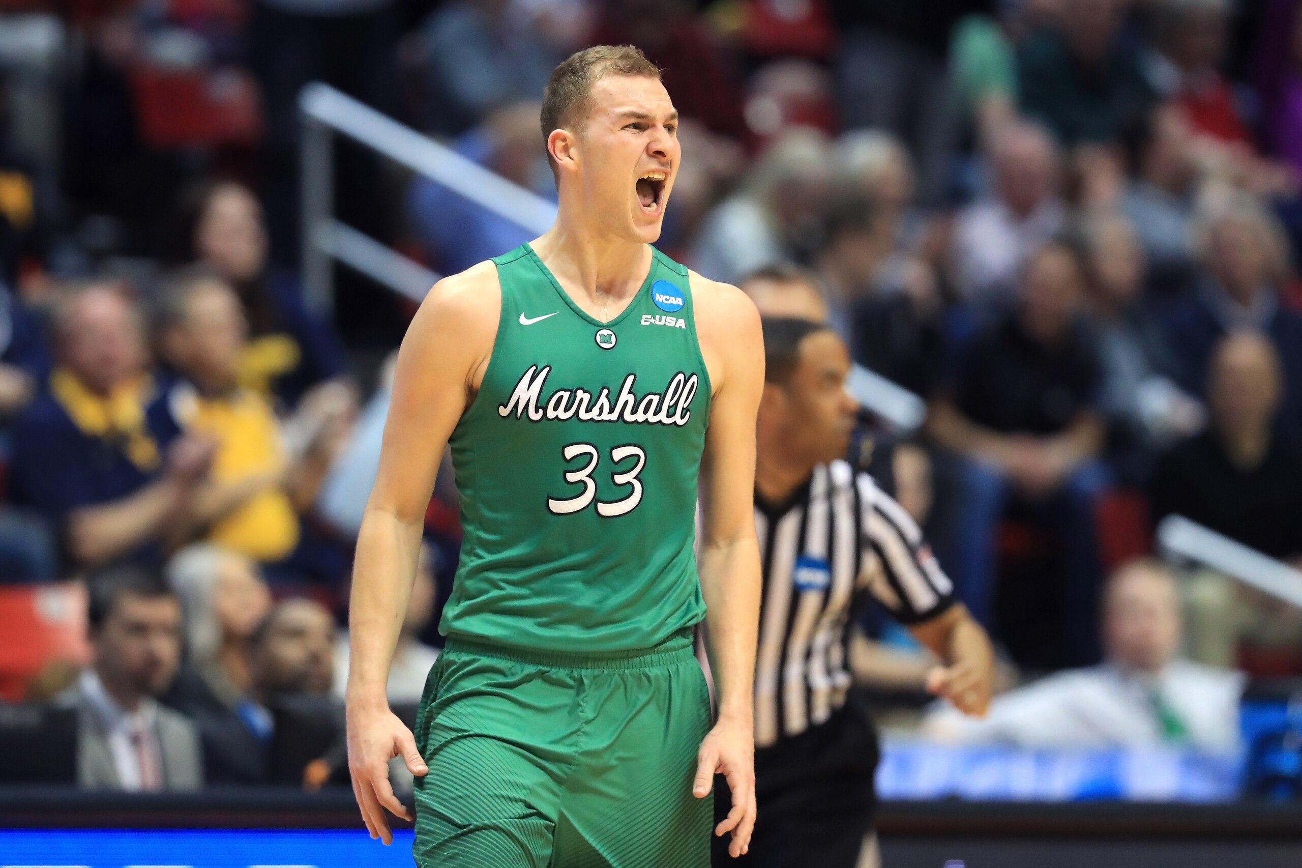 SAN DIEGO, CA - MARCH 16:  Jon Elmore #33 of the Marshall Thundering Herd reacts after a three point basket in the second half against the Wichita State Shockers during the first round of the 2018 NCAA Men's Basketball Tournament at Viejas Arena on March 