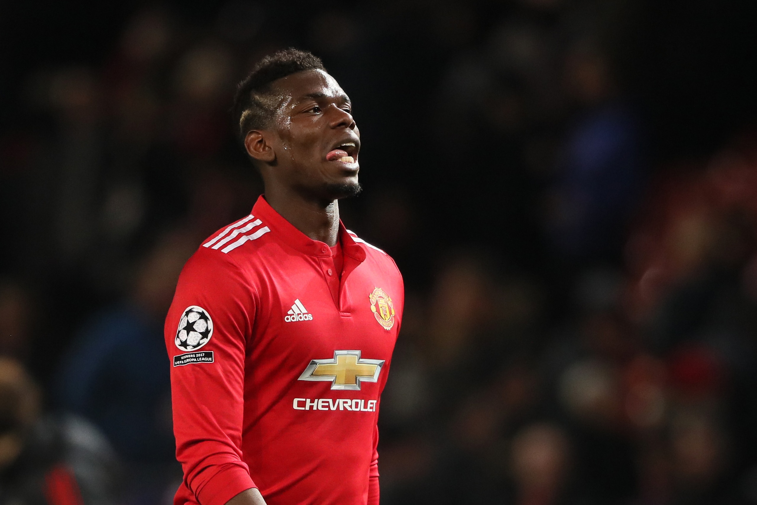 MANCHESTER, ENGLAND - MARCH 13: A dejected Paul Pogba of Manchester United during the UEFA Champions League Round of 16 Second Leg match between Manchester United and Sevilla FC at Old Trafford on March 13, 2018 in Manchester, United Kingdom. (Photo by Ma