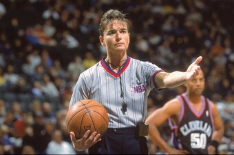 15 Feb 2001:  Referee Dee Kantner signals on the court during the game between the Dallas Mavericks and  the Cleveland Cavaliers at the Reunion Arena in Dallas, Texas.  The Mavericks defeated the Cavaliers 102-81.  NOTE TO USER: It is expressly understood