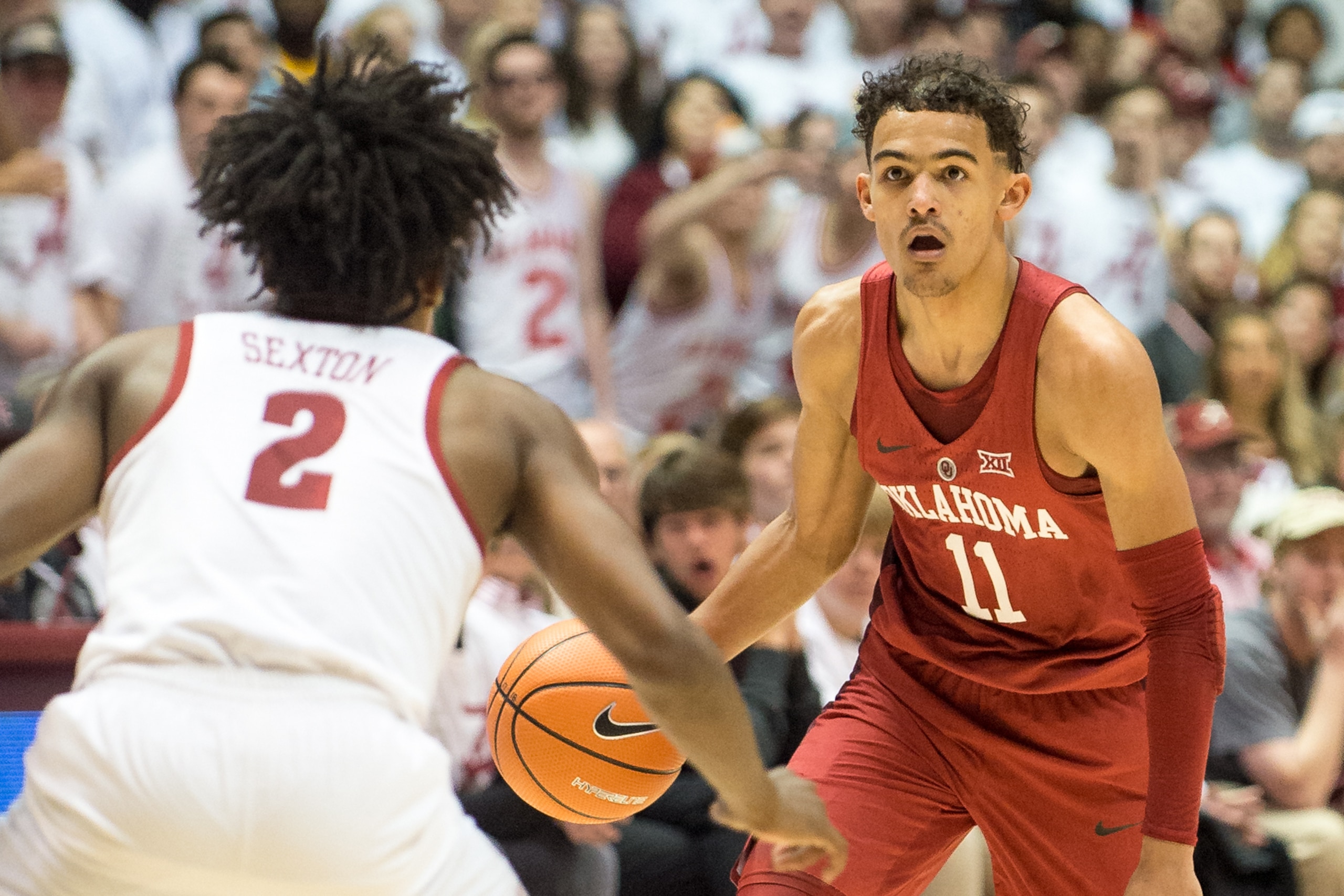 TUSCALOOSA, AL - JANUARY 27: Trae Young #11 of the Oklahoma Sooners looks to maneuver by Collin Sexton #2 of the Alabama Crimson Tide during the game at Coleman Coliseum on January 27, 2018 in Tuscaloosa, Alabama.  (Photo by Michael Chang/Getty Images)
