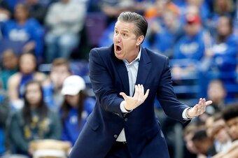 ST LOUIS, MO - MARCH 11:  John Calipari the head coach of the Kentucky Wildcats give sinstructions to his team against the Tennessee Volunteers during the Championship game of the 2018 SEC Basketball Tournament at Scottrade Center on March 11, 2018 in St 