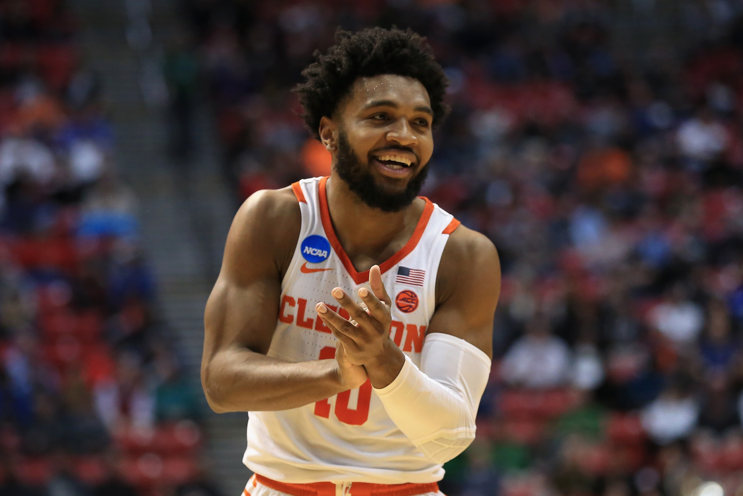 SAN DIEGO, CA - MARCH 16:  Gabe DeVoe #10 of the Clemson Tigers celebrates as they take on the New Mexico State Aggies in the second half in the first round of the 2018 NCAA Men's Basketball Tournament at Viejas Arena on March 16, 2018 in San Diego, Calif