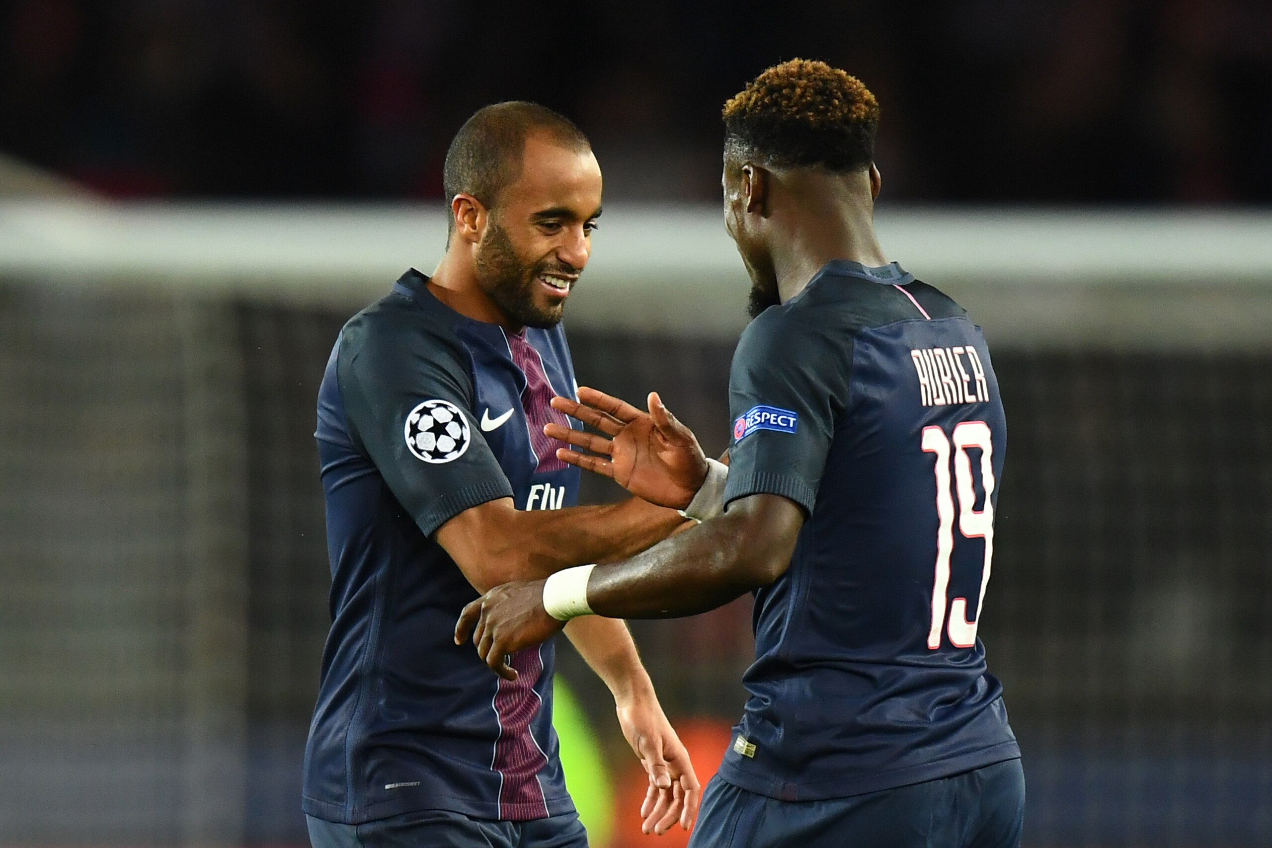 Paris Saint-Germain's Brazilian midfielder Lucas Moura celebrates with Paris Saint-Germain's Ivorian defender Serge Aurier (R) after scoring a goal during the UEFA Champions League group A football match between Paris Saint-Germain (PSG) and Basel at the Paris Saint-Germain's Brazilian midfielder Lucas Moura celebrates with Paris Saint-Germain's Ivorian defender Serge Aurier (R) after scoring a goal during the UEFA Champions League group A football match between Paris Saint-Germain (PSG) and Basel at the