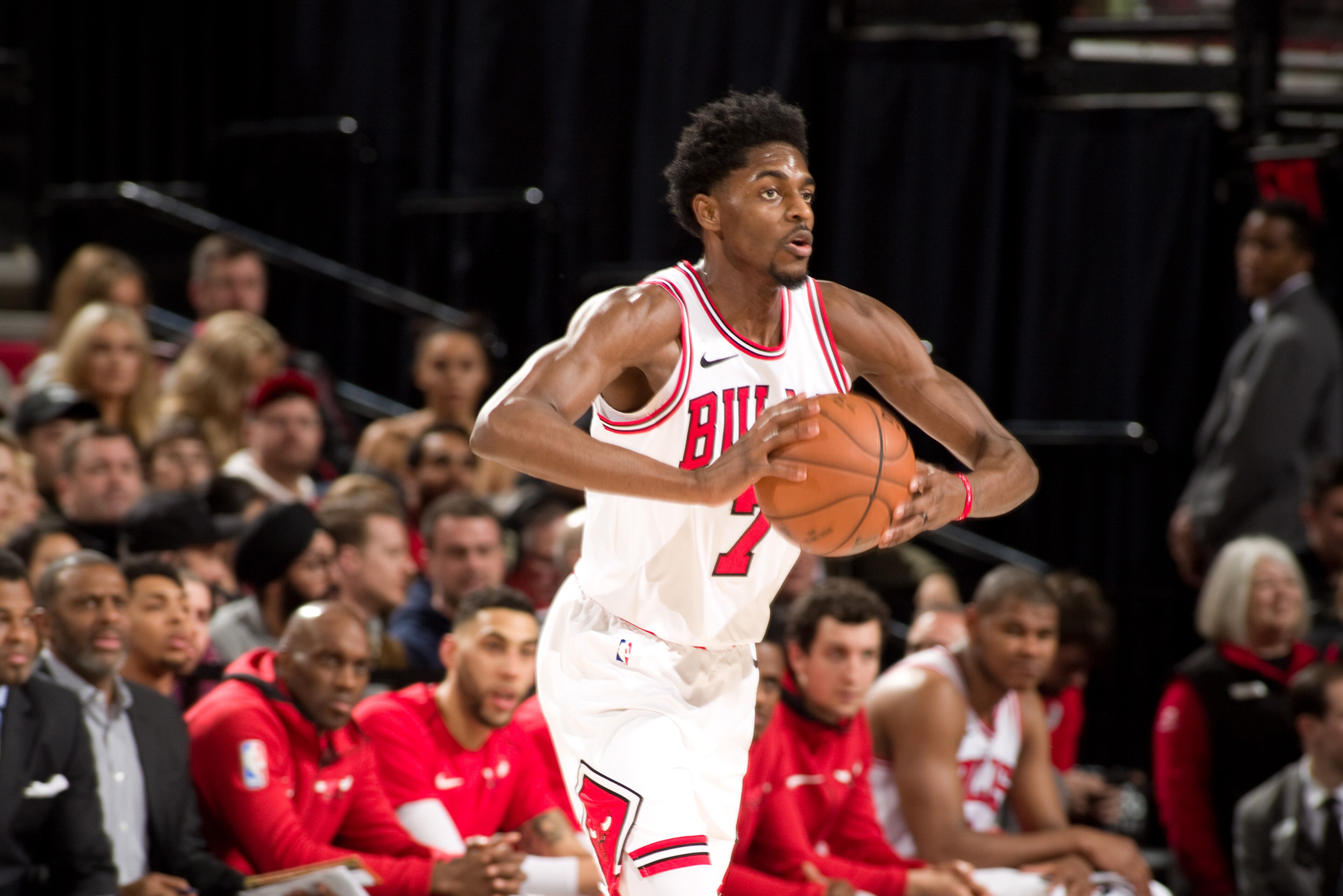 PORTLAND, OR - JANUARY 31: Justin Holiday #7 of the Chicago Bulls handles the ball during the game against the Portland Trail Blazers on January 31, 2018 at the Moda Center Arena in Portland, Oregon. NOTE TO USER: User expressly acknowledges and agrees t PORTLAND, OR - JANUARY 31: Justin Holiday #7 of the Chicago Bulls handles the ball during the game against the Portland Trail Blazers on January 31, 2018 at the Moda Center Arena in Portland, Oregon. NOTE TO USER: User expressly acknowledges and agrees t