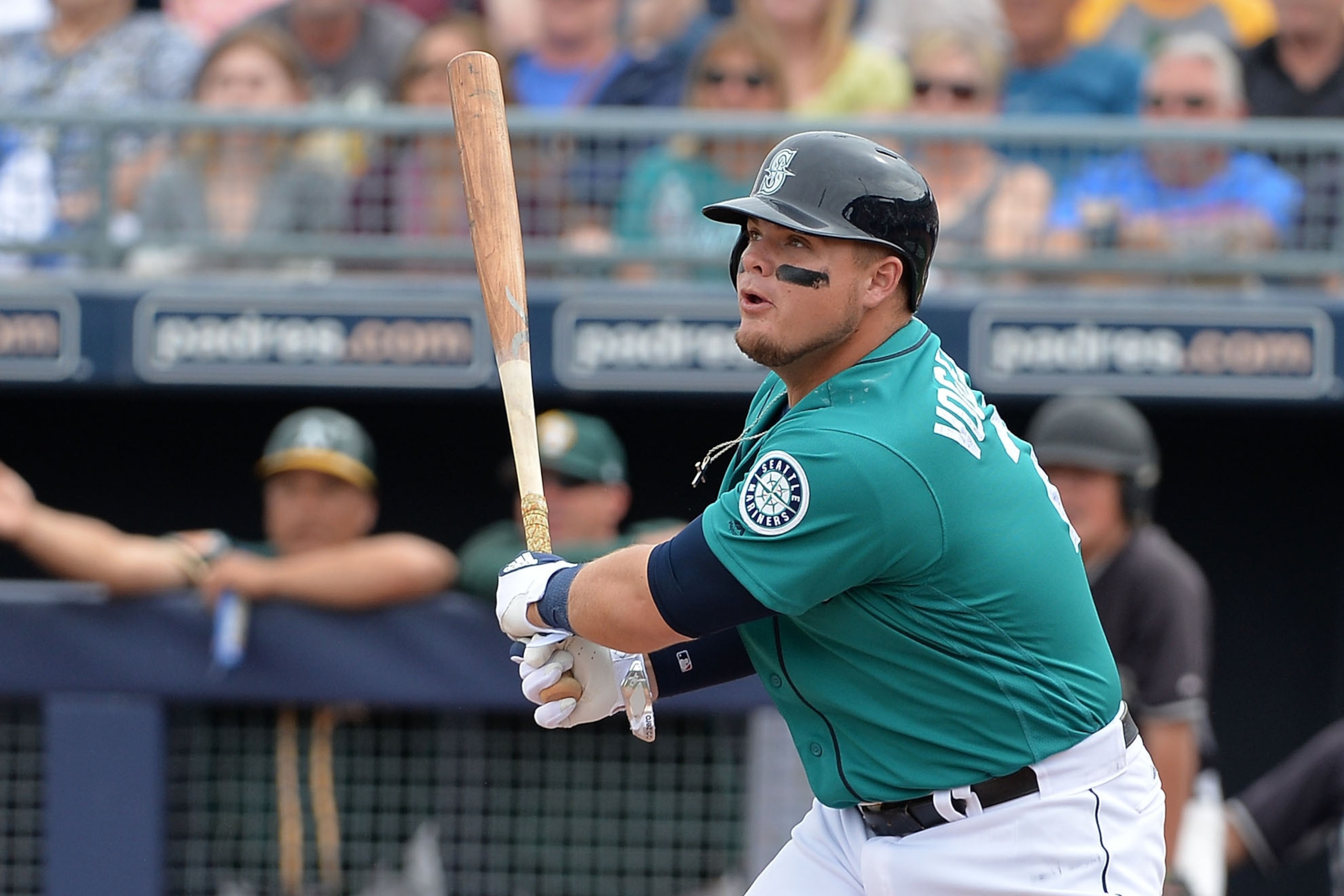 PEORIA, AZ - MARCH 05:  Dan Vogelbach #20 of the Seattle Mariners hits a double against the Oakland Athletics during the spring training game at Peoria Stadium on March 5, 2017 in Peoria, Arizona.  (Photo by Jennifer Stewart/Getty Images)