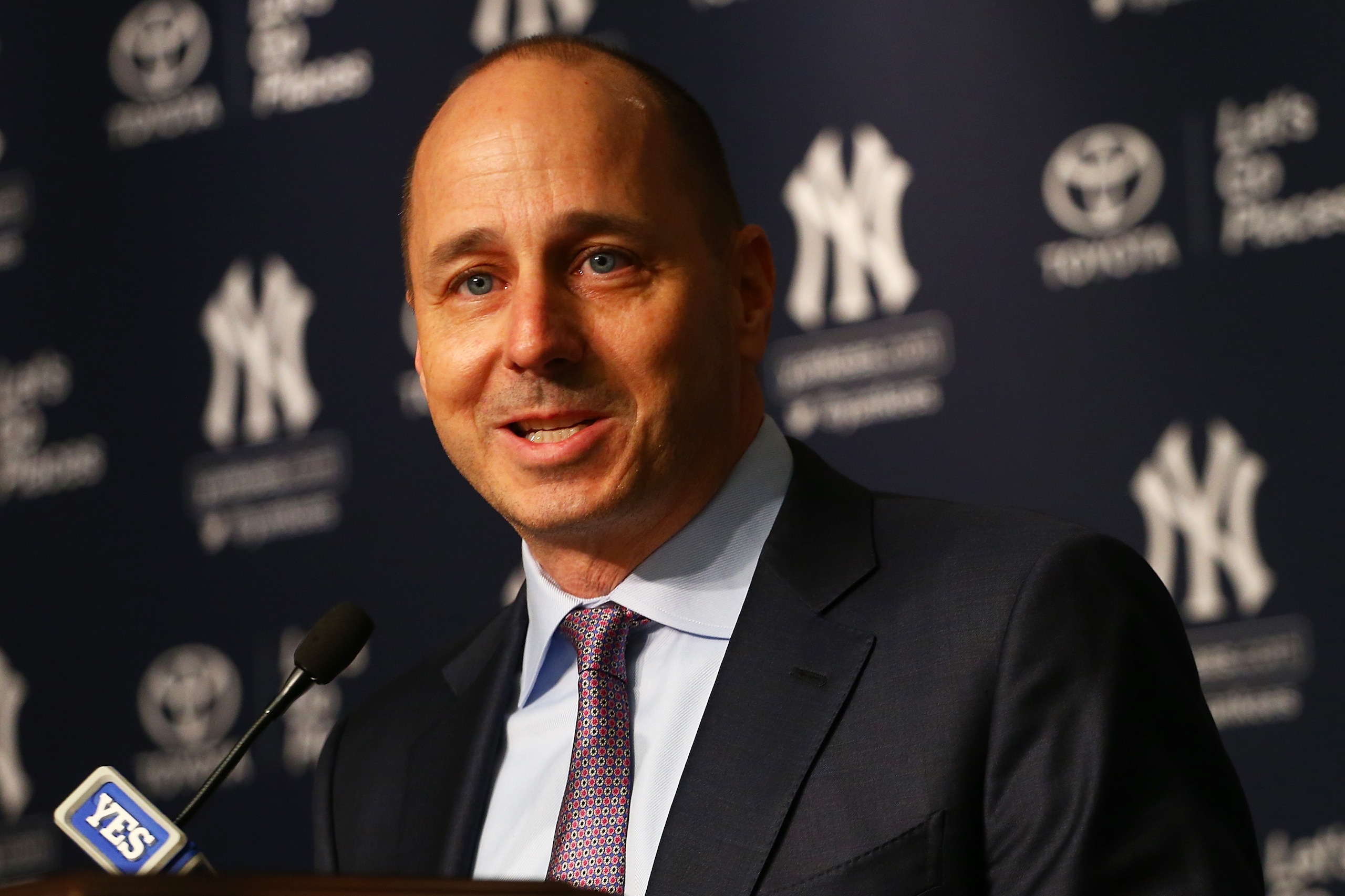 NEW YORK, NY - DECEMBER 06:  Senior Vice President, General Manager Brian Cashman speaks to the media prior to introducing Aaron Boone as New York Yankee manager at Yankee Stadium on December 6, 2017 in the Bronx borough of New York City.  (Photo by Mike 