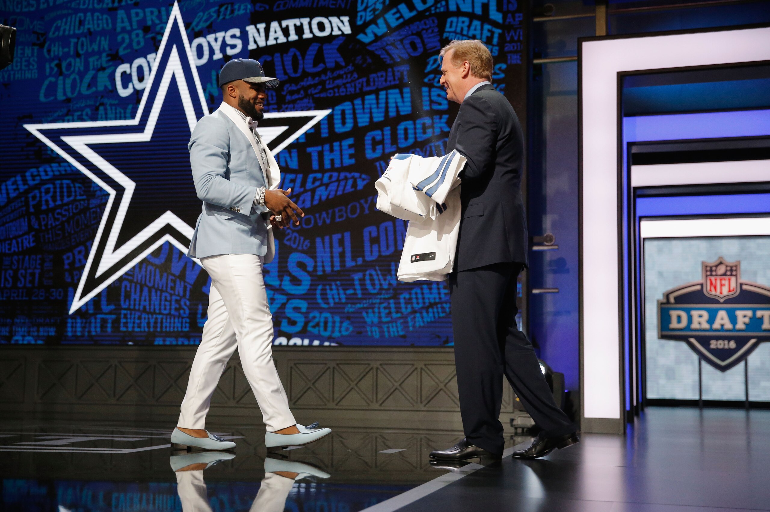 CHICAGO, IL - APRIL 28: Ezekiel Elliott of Ohio State reacts after being picked #4 overall by the Dallas Cowboys during the first round of the 2016 NFL Draft at the Auditorium Theatre of Roosevelt University on April 28, 2016 in Chicago, Illinois. (Phot CHICAGO, IL - APRIL 28: Ezekiel Elliott of Ohio State reacts after being picked #4 overall by the Dallas Cowboys during the first round of the 2016 NFL Draft at the Auditorium Theatre of Roosevelt University on April 28, 2016 in Chicago, Illinois. (Phot