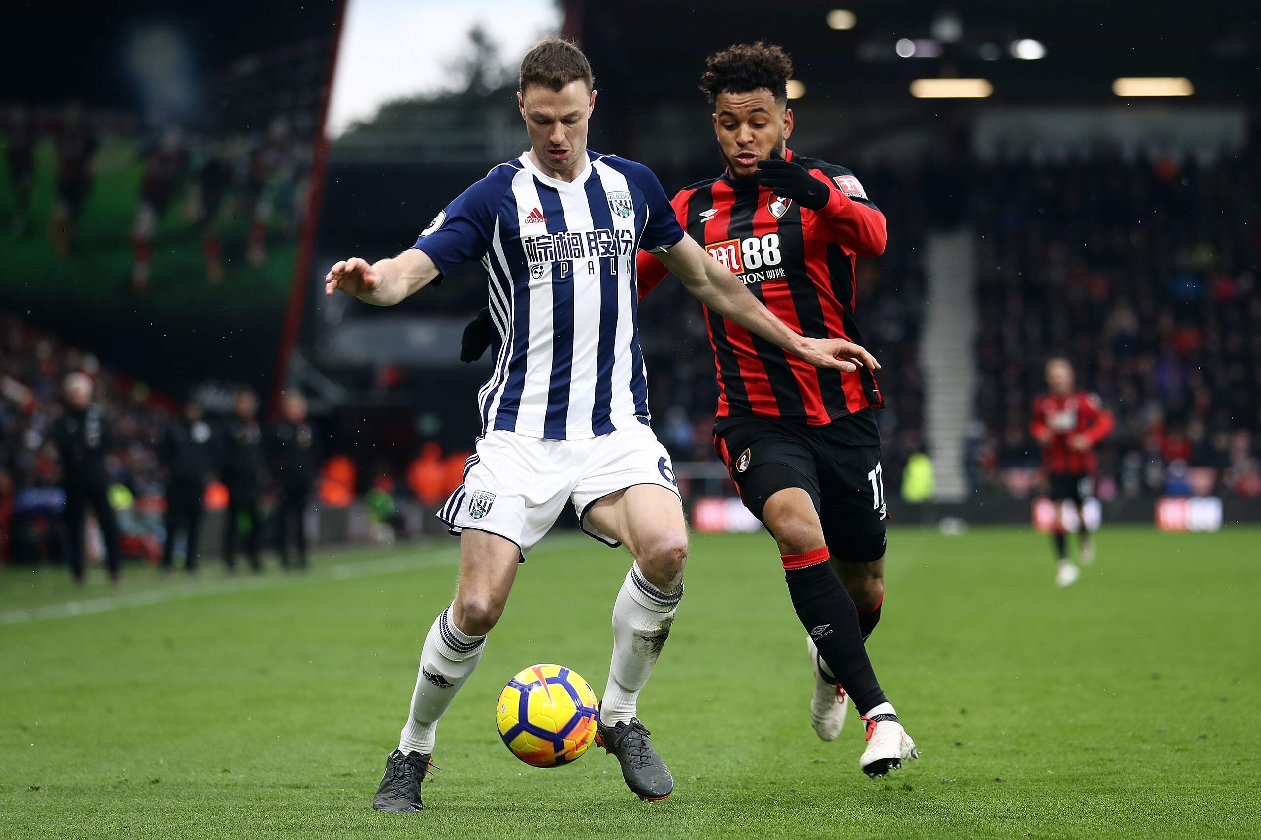 BOURNEMOUTH, ENGLAND - MARCH 17:  Jonny Evans of West Bromwich Albion is challenged by Joshua King of AFC Bournemouth during the Premier League match between during the Premier League match between AFC Bournemouth and West Bromwich Albion at Vitality Stad