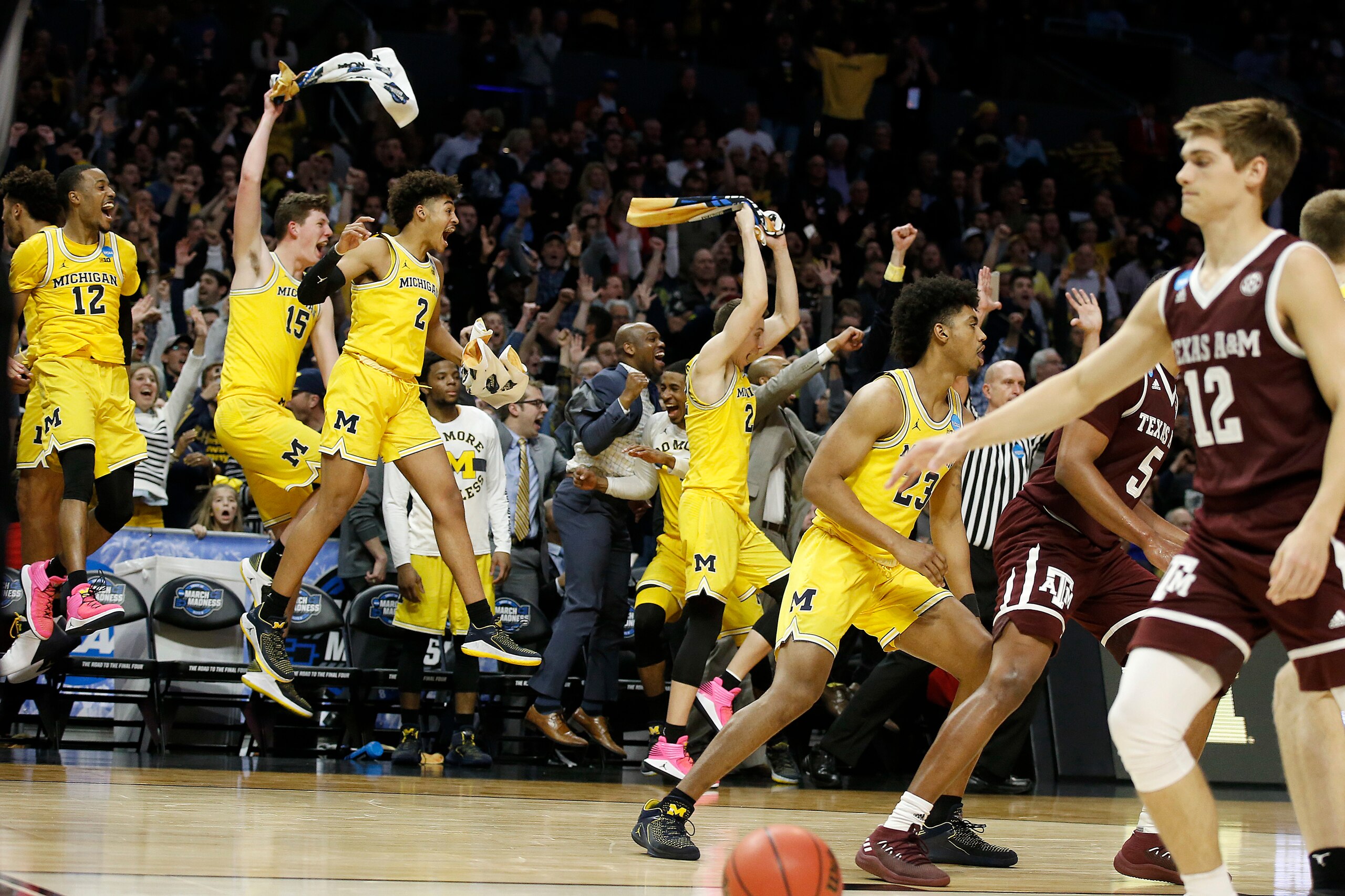 Victorious Michigan is among the Elite Eight after pounding Texas A&M.