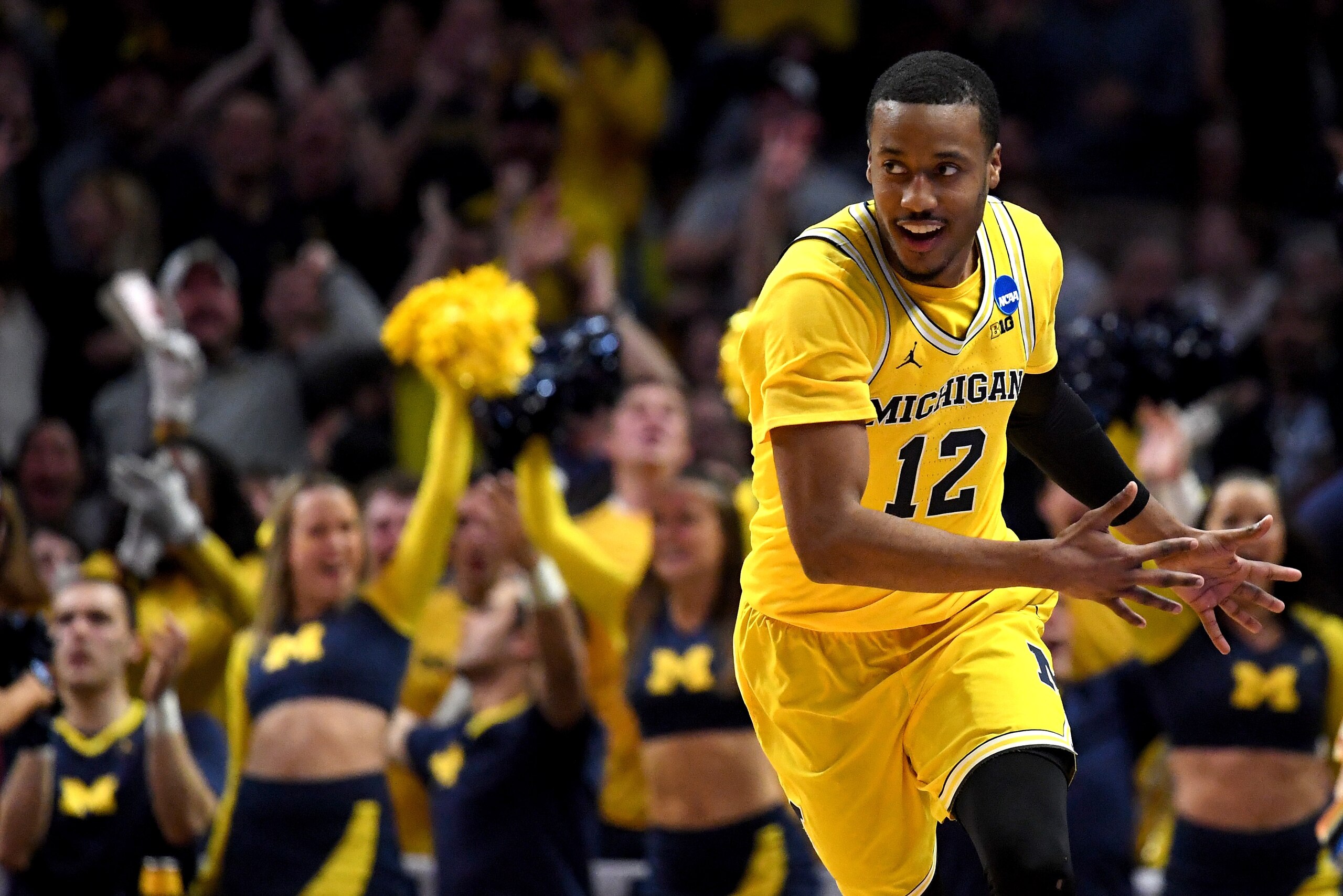 LOS ANGELES, CA - MARCH 22:  Muhammad-Ali Abdur-Rahkman #12 of the Michigan Wolverines celebrates after making a three-pointer against the Texas A&M Aggies in the second half in the 2018 NCAA Men's Basketball Tournament West Regional at Staples Center on 