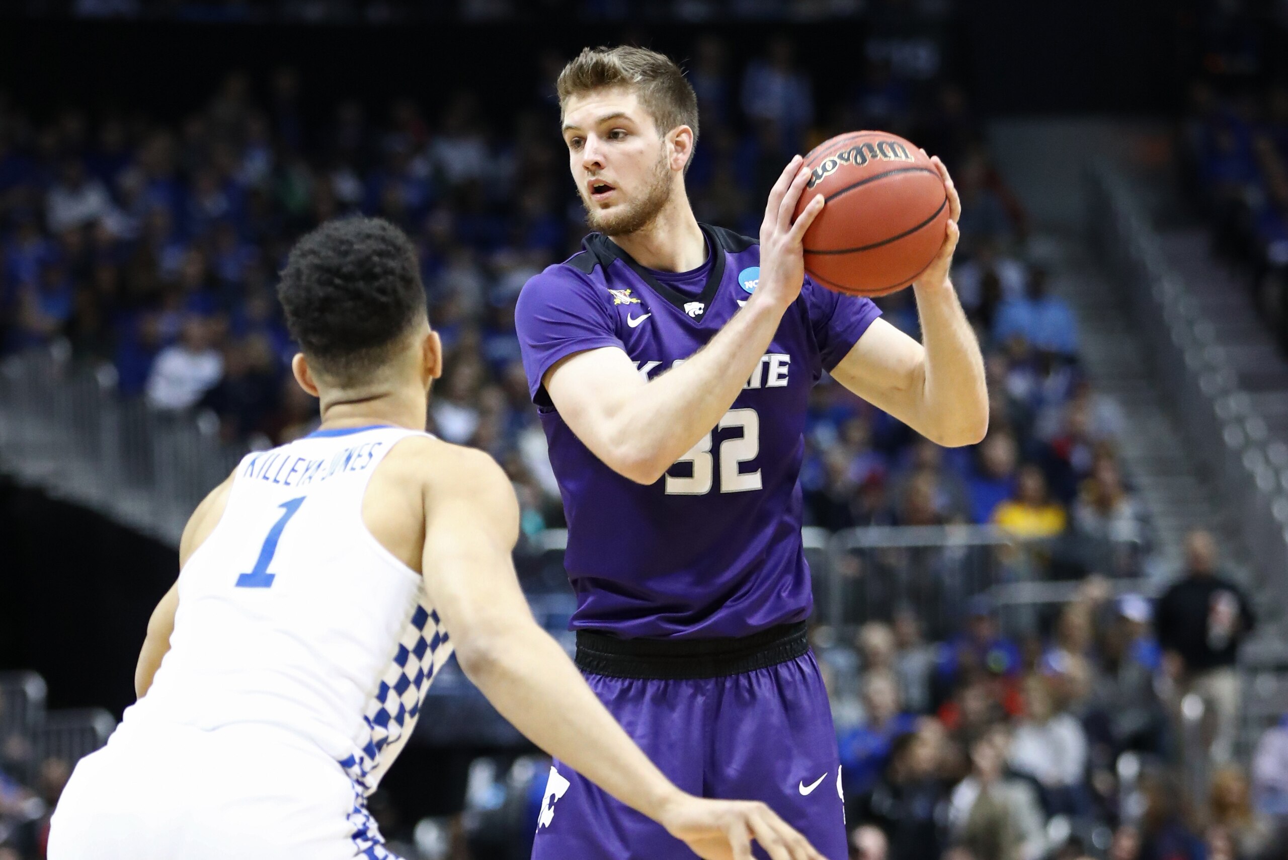 ATLANTA, GA - MARCH 22:  Dean Wade #32 of the Kansas State Wildcats is defended by Sacha Killeya-Jones #1 of the Kentucky Wildcats in the first half during the 2018 NCAA Men's Basketball Tournament South Regional at Philips Arena on March 22, 2018 in Atla