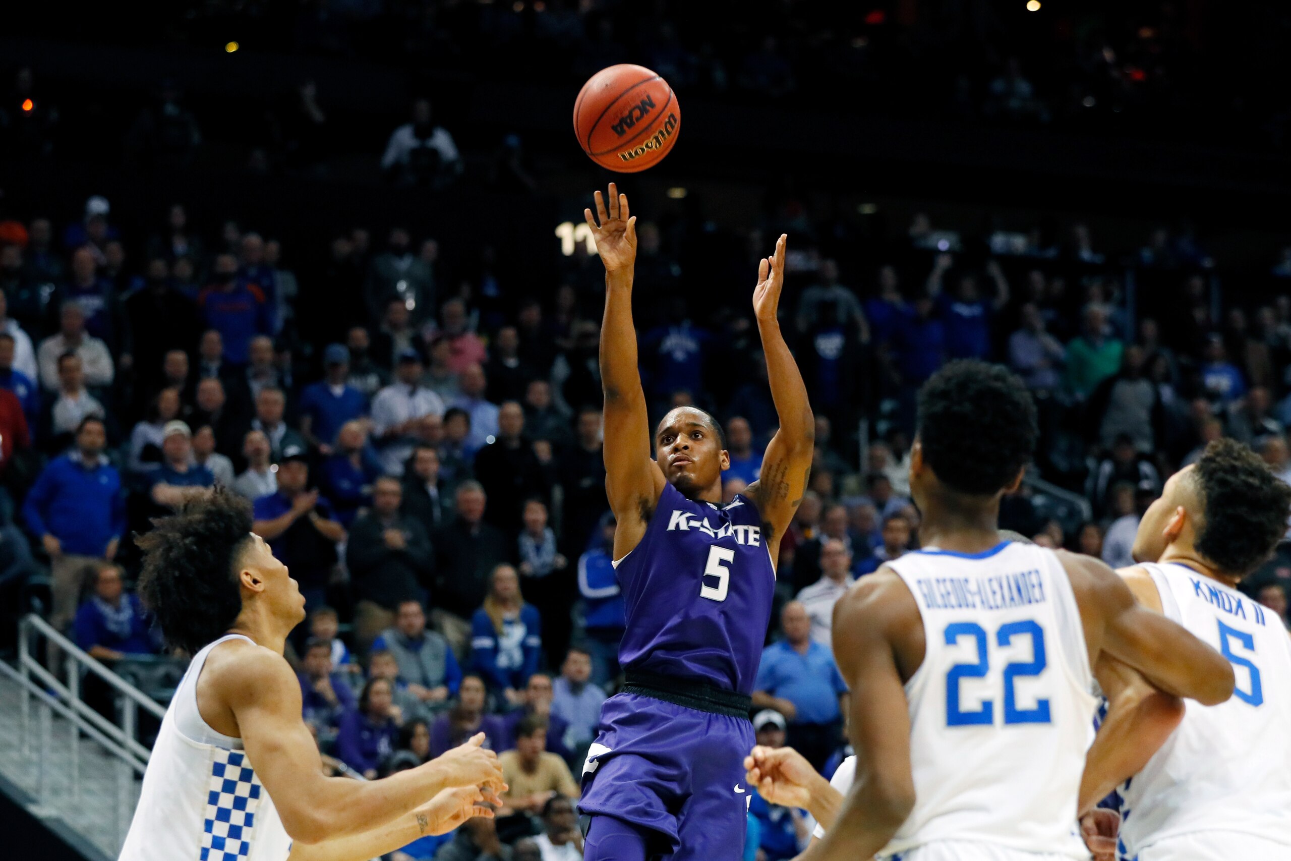 ATLANTA, GA - MARCH 22: Barry Brown #5 of the Kansas State Wildcats attempts a jump shot against the Kentucky Wildcats in the second half during the 2018 NCAA Men's Basketball Tournament South Regional at Philips Arena on March 22, 2018 in Atlanta, Georgi