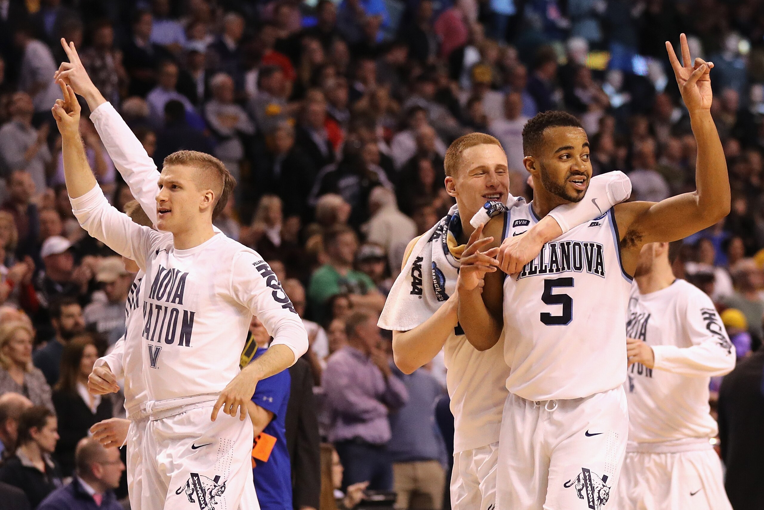 BOSTON, MA - MARCH 23:  Phil Booth #5 of the Villanova Wildcats celebrates with teammates after defeating the West Virginia Mountaineers 90-78 in the 2018 NCAA Men's Basketball Tournament East Regional at TD Garden on March 23, 2018 in Boston, Massachuset