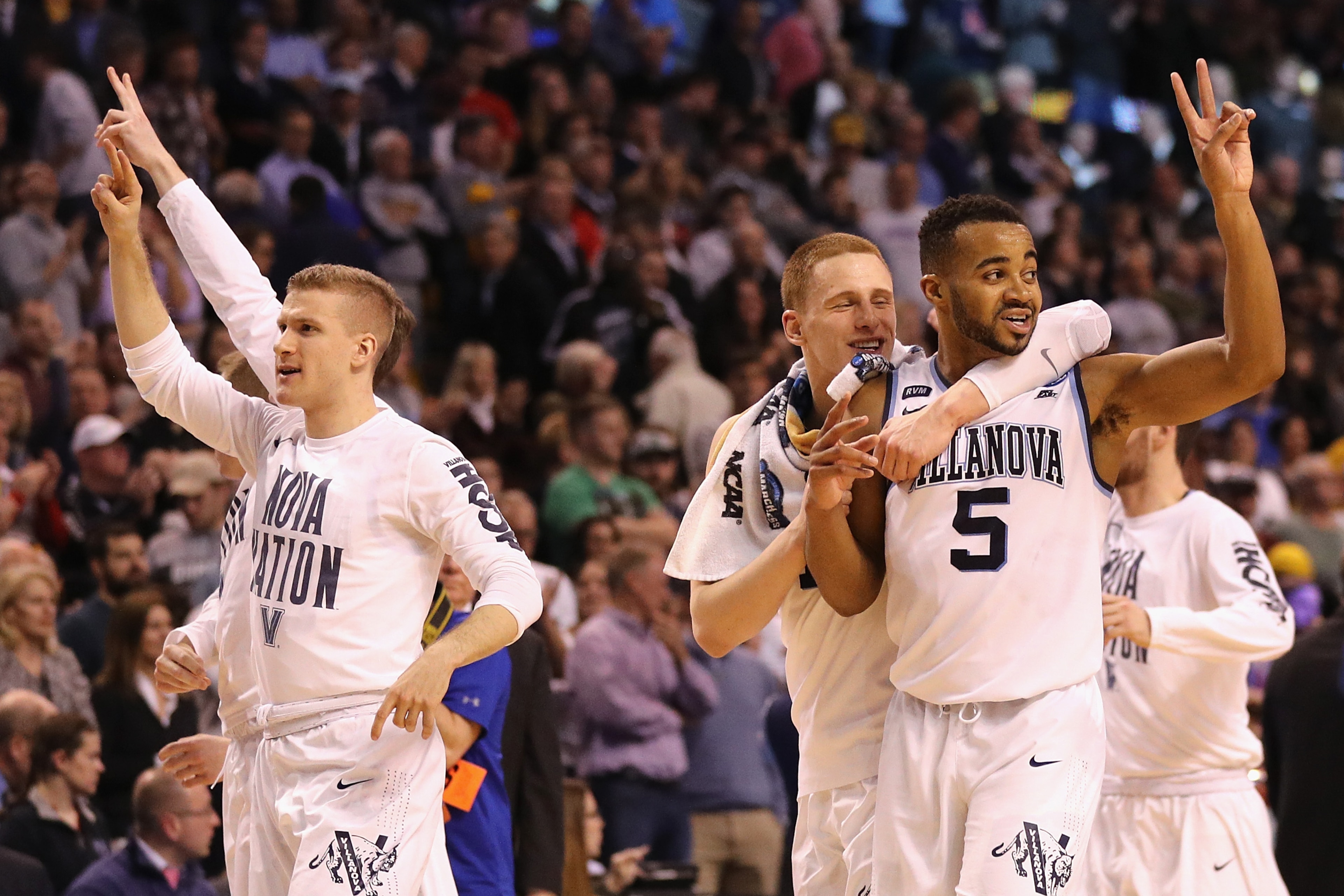 BOSTON, MA - MARCH 23:  Phil Booth #5 of the Villanova Wildcats celebrates with teammates after defeating the West Virginia Mountaineers 90-78 in the 2018 NCAA Men's Basketball Tournament East Regional at TD Garden on March 23, 2018 in Boston, Massachuset
